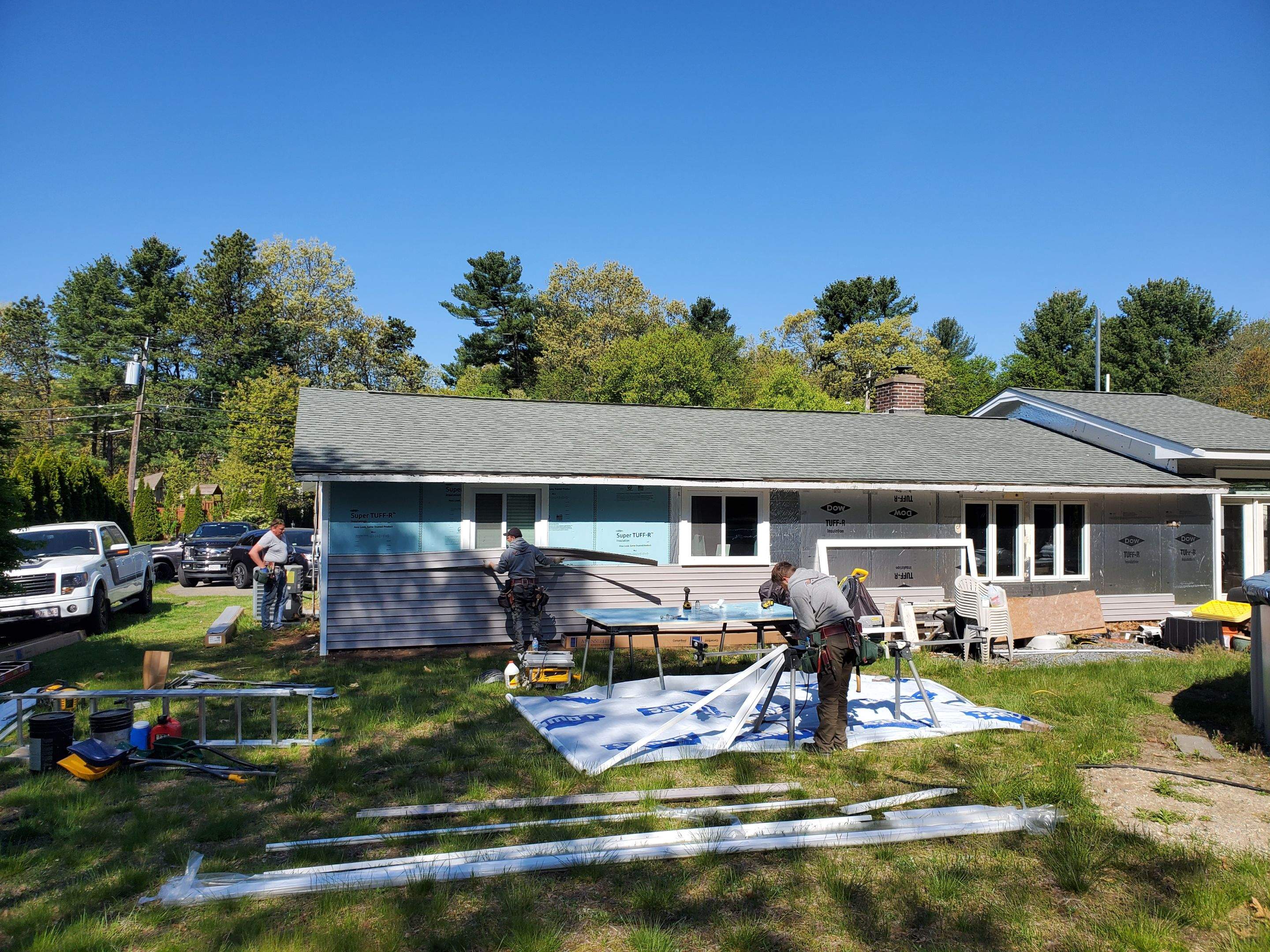 Siding Installation using insulation, PVC trim and vinyl siding by UBrothers Construction