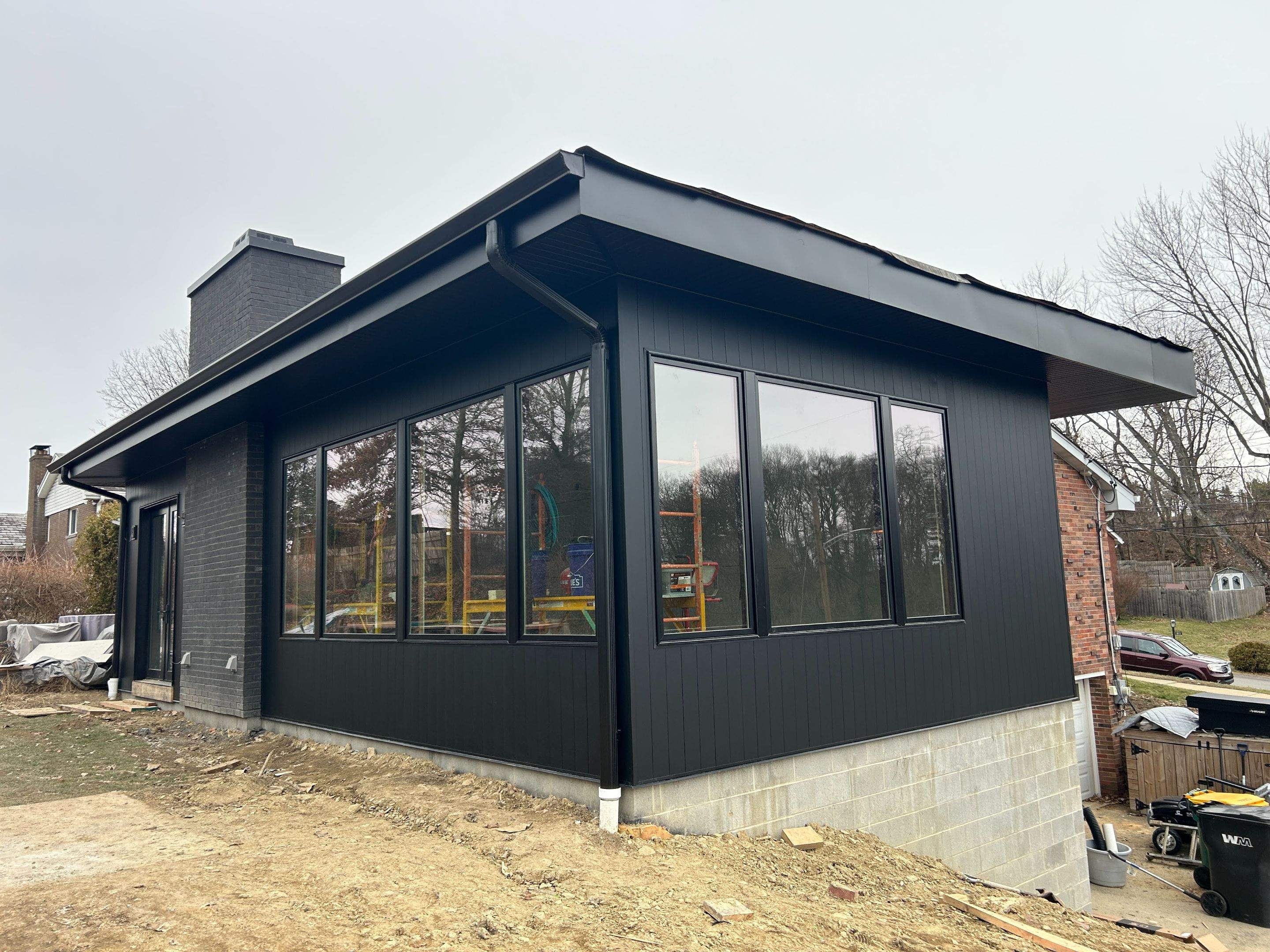 Modern Home Addition with Matte Black Siding in Pittsburgh by Ideal Siding Pittsburgh