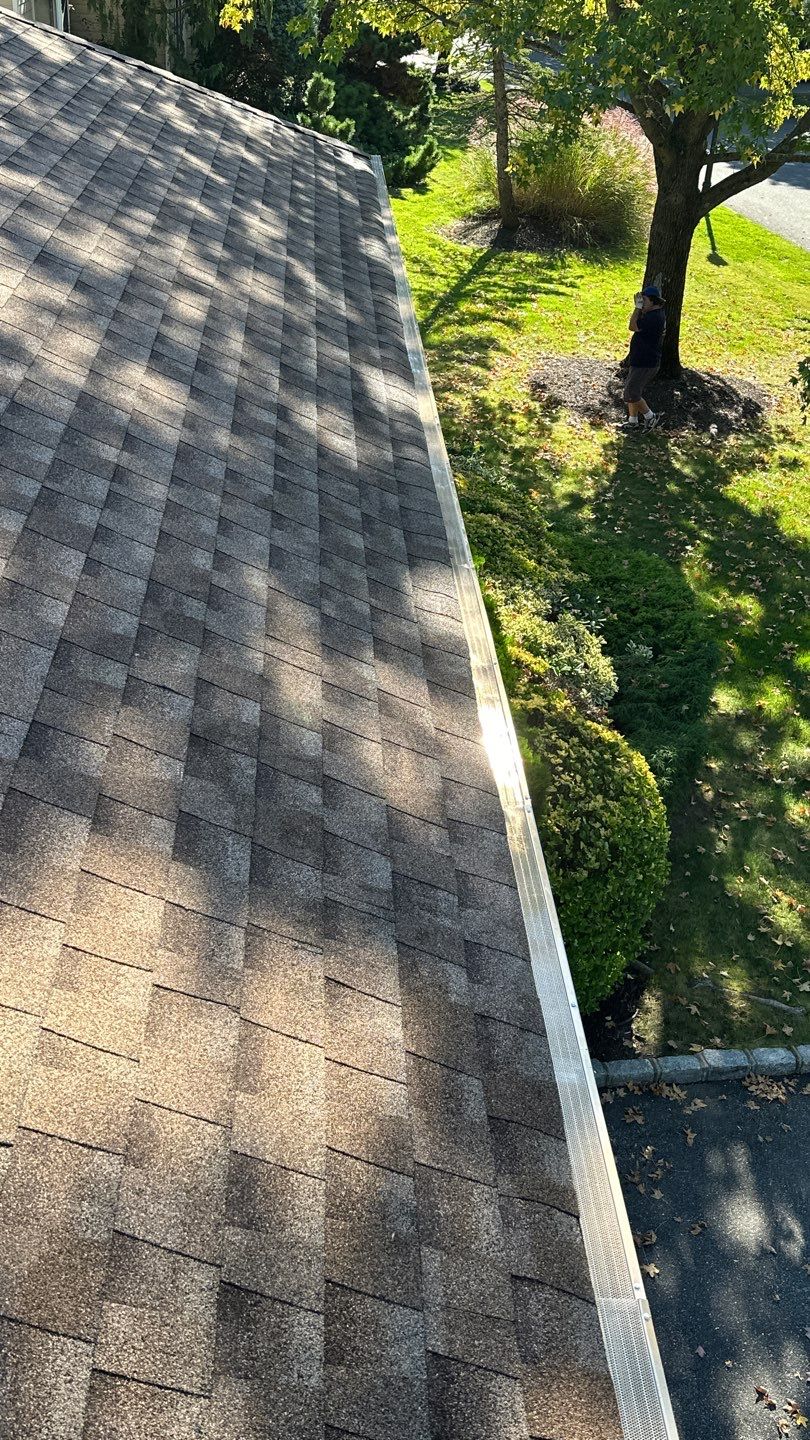 Roslyn Gutter Cleaning and Microguard Gutter Shield Installation by Above All Gutters 