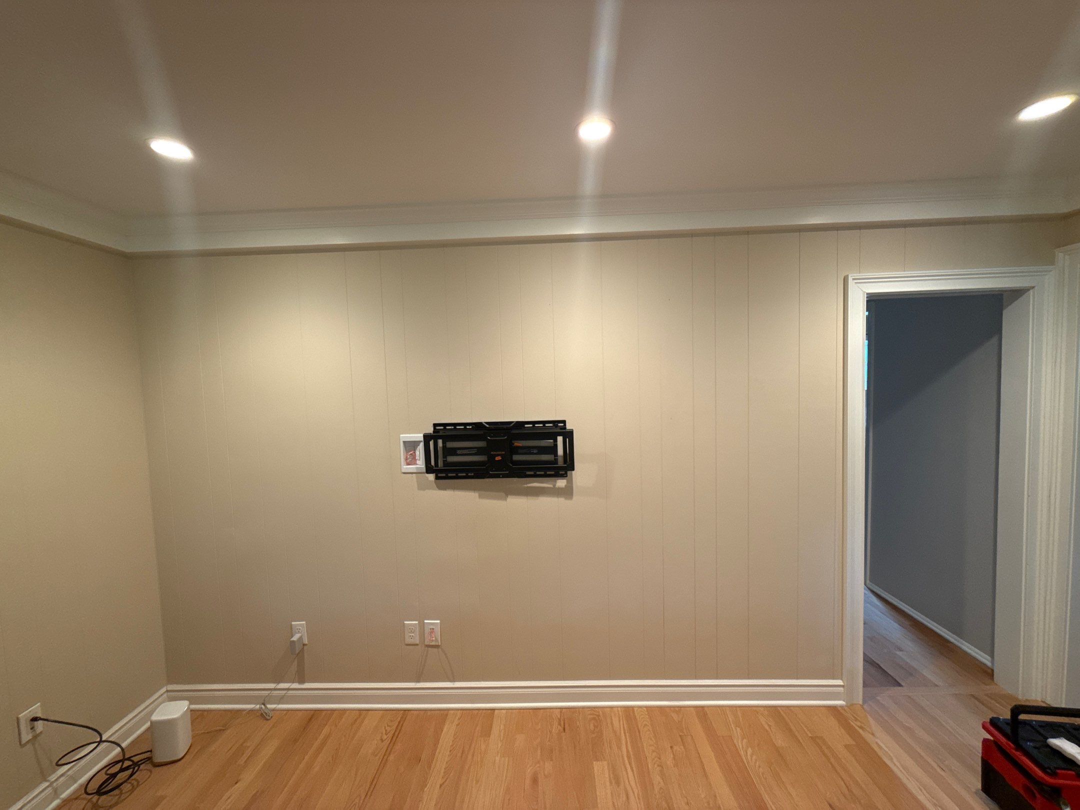 TV Mount & Hidden Wiring / Recessed Outlet Installation by Spartan Home Pros