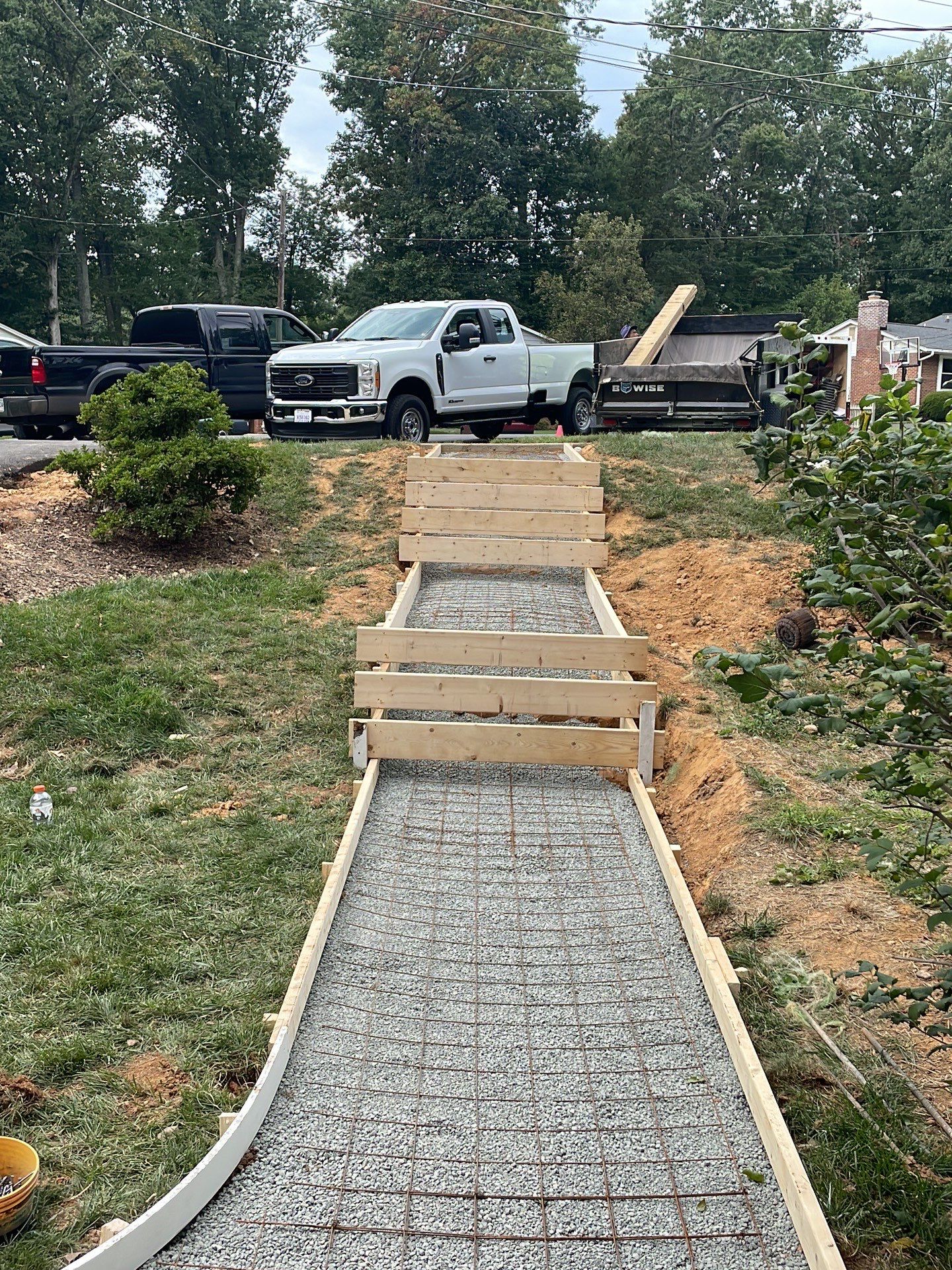 New walkway with stairs and a new front porch by Fairfax Contractors, LLC