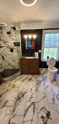 Bathroom Remodel using Soaker tub, vanities, tile, new shower