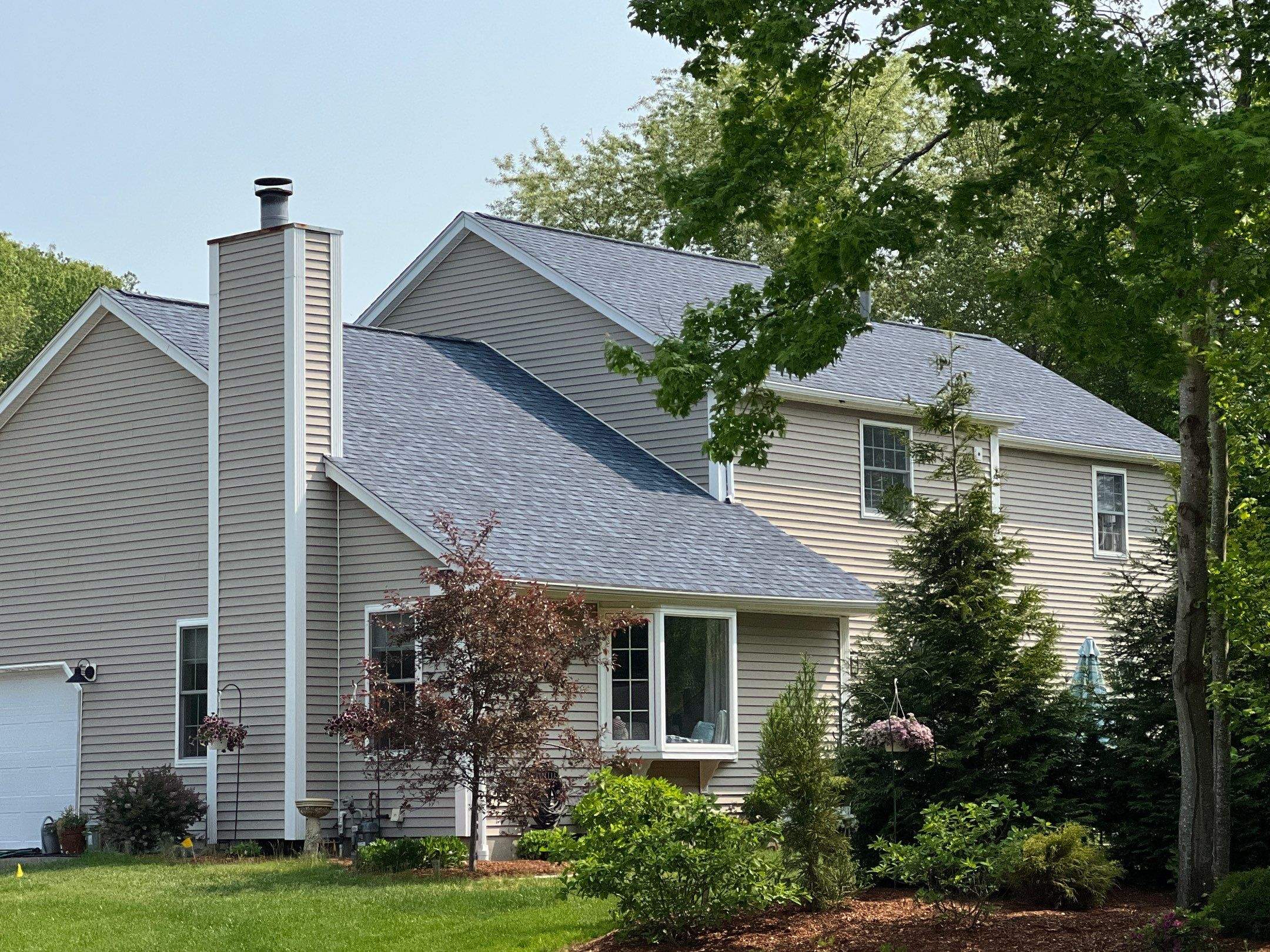 Coastal Blue Roofs by Pinnacle Roofing & Skylights