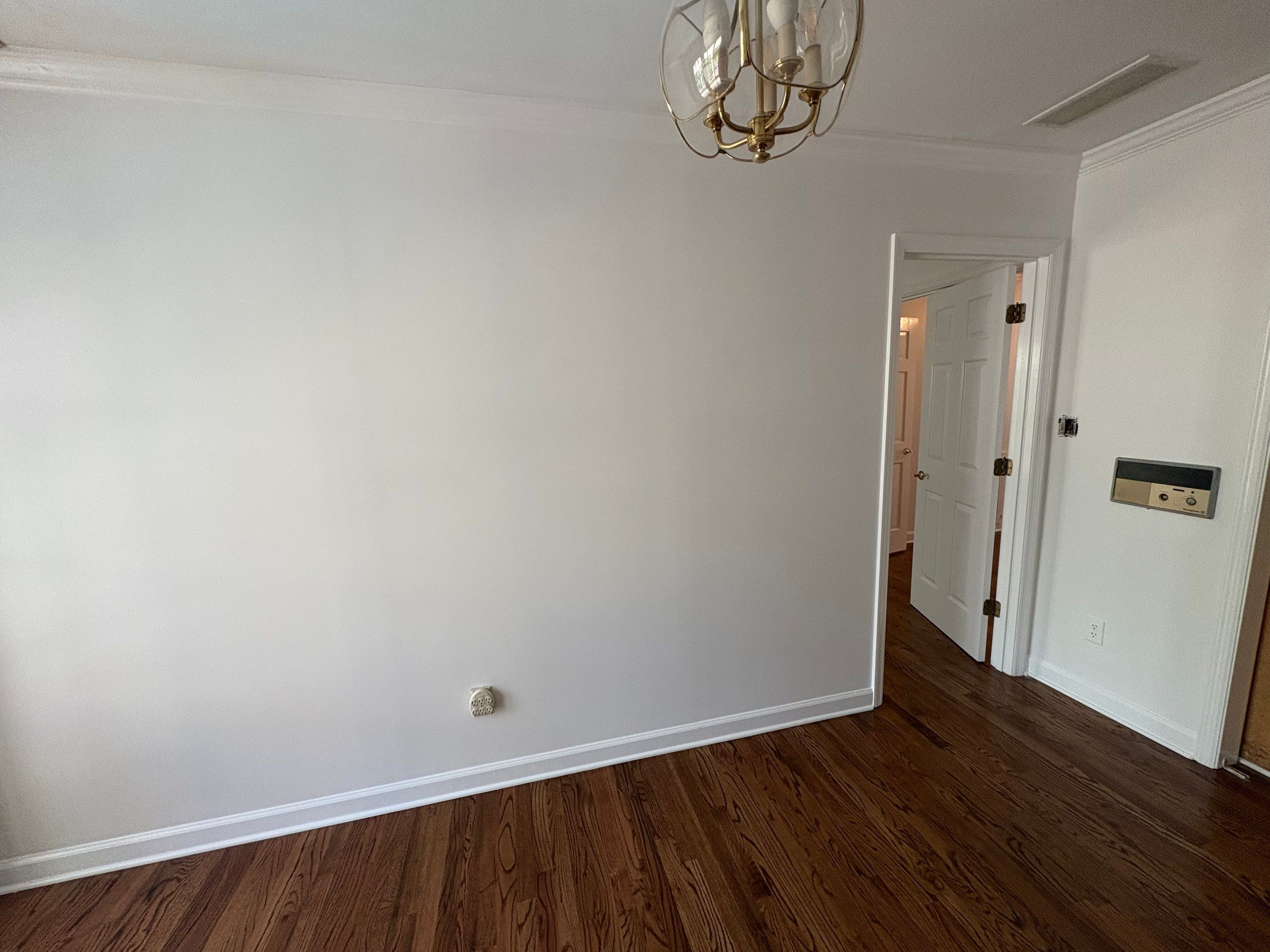 From Outdated to Elegant: A Timeless White Transformation by Atlanta's Paint Doctor