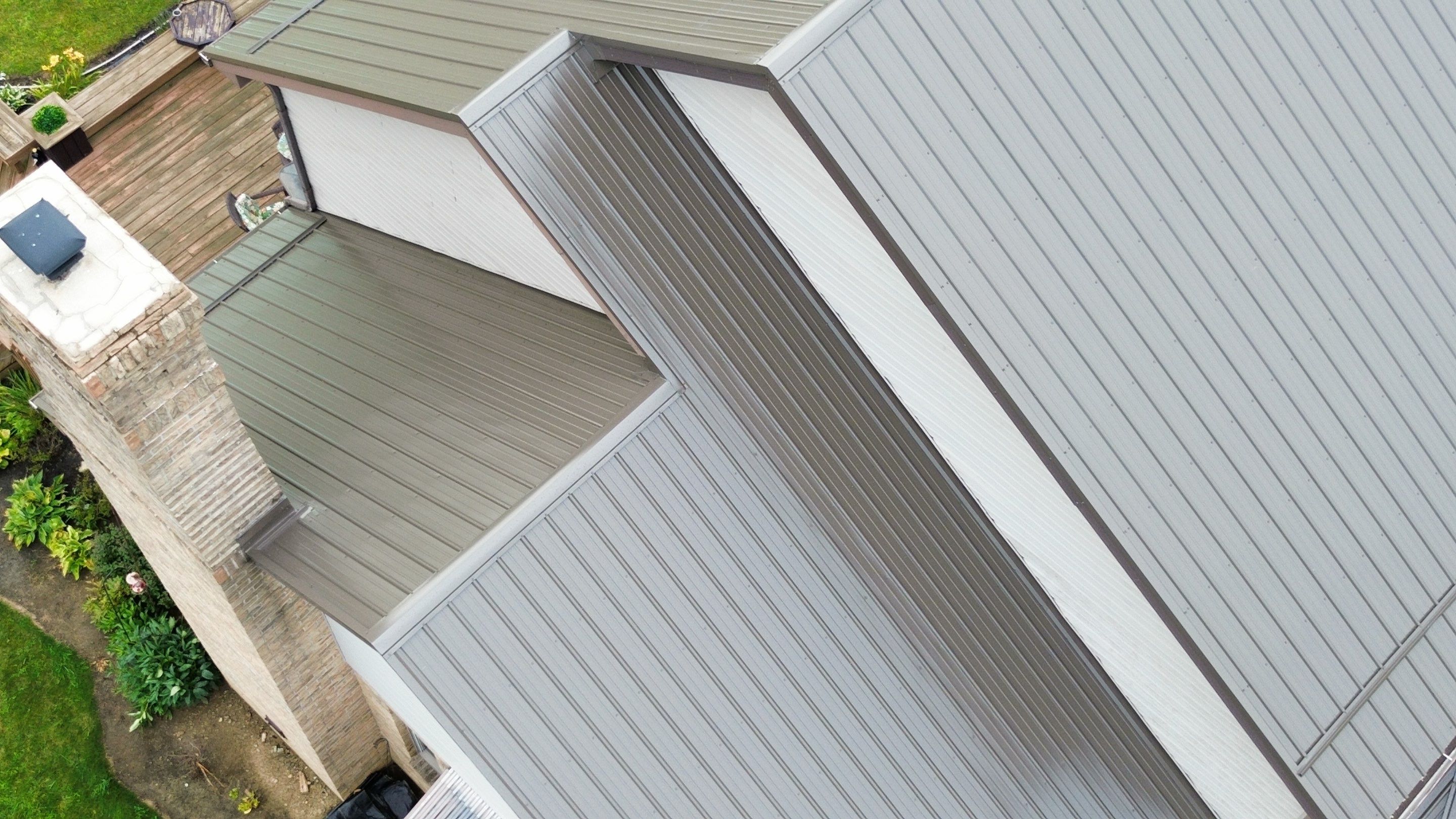 Residential Roofing Installation using Performance Panel Metal - Burnished Slate by RoofX 