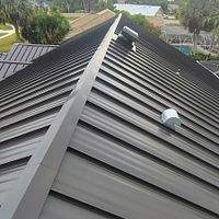 24ga 1.5" Mechanical Seam Dark Bronze by Total Roofing System The Metal Roof Experts