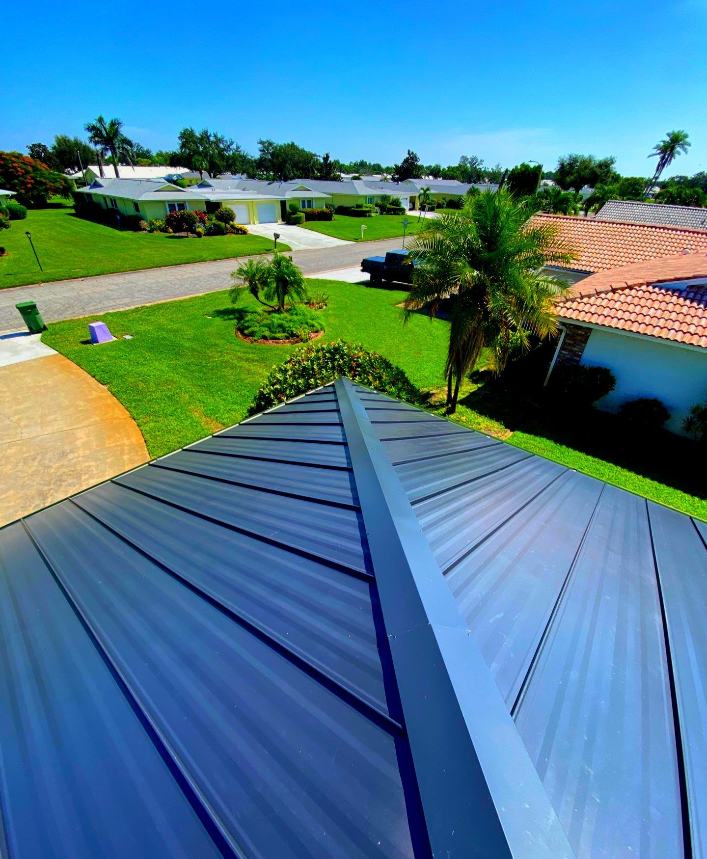 Metal Roofing System by Rooster Roofing, LLC