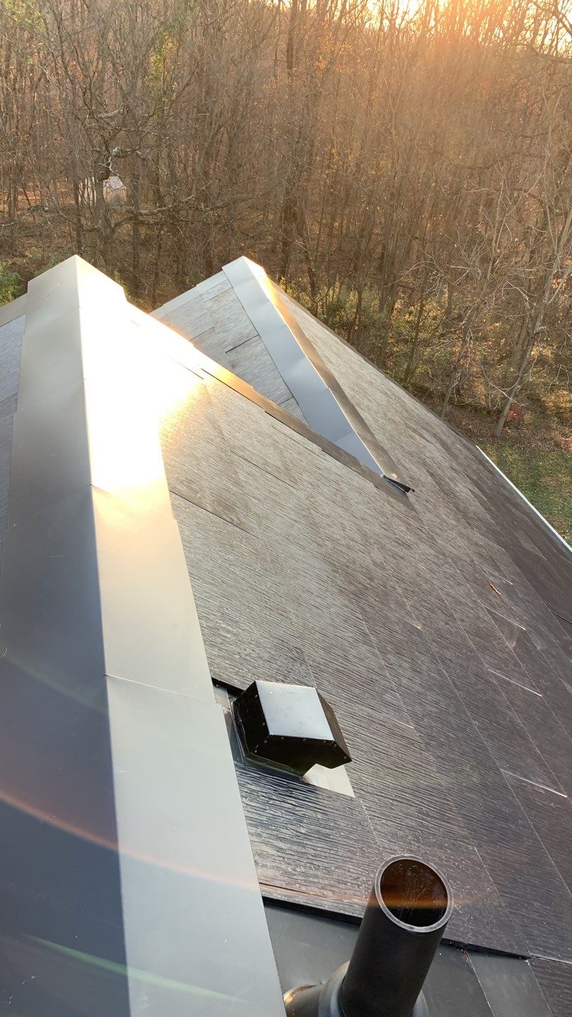 Tesla Solar Roof Replacement by American Home Contractors