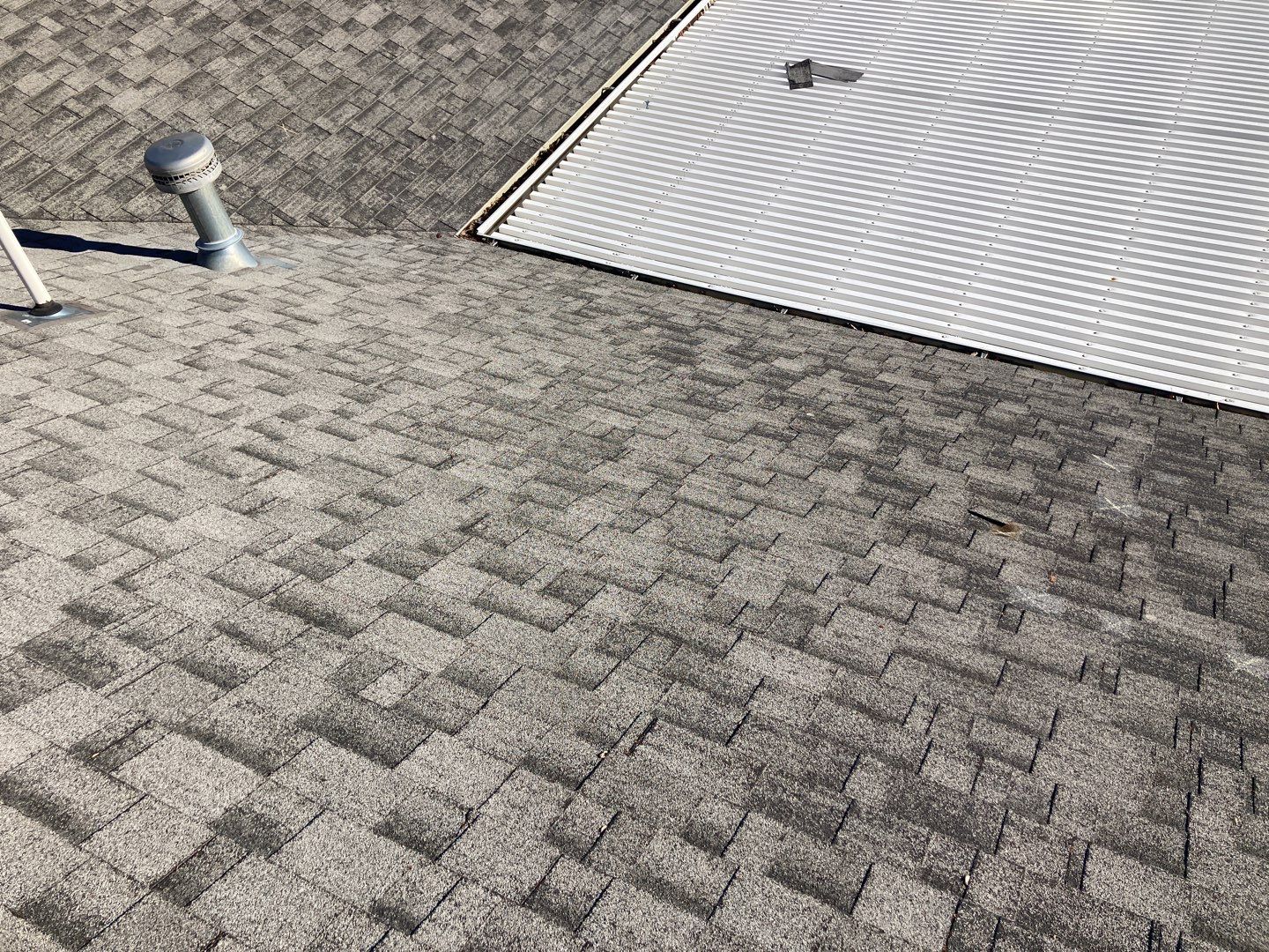 Two story farmhouse style roofing installation using Owens Corning Duration in the color Teak by ID Roofing LLC