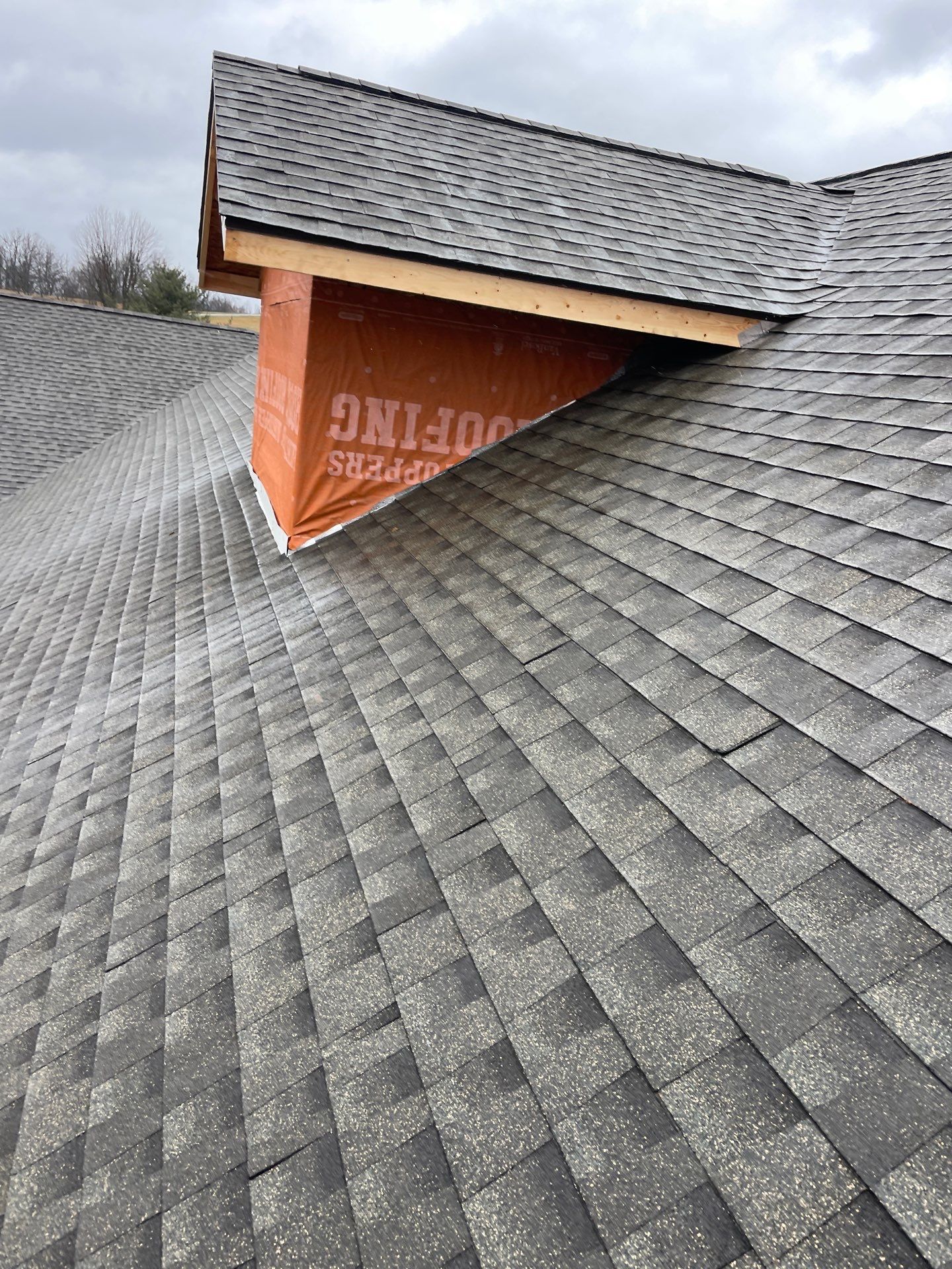 Residential Roofing Installation using GAF Timberline HDZ Weathered Wood by Rainstoppers Roofing