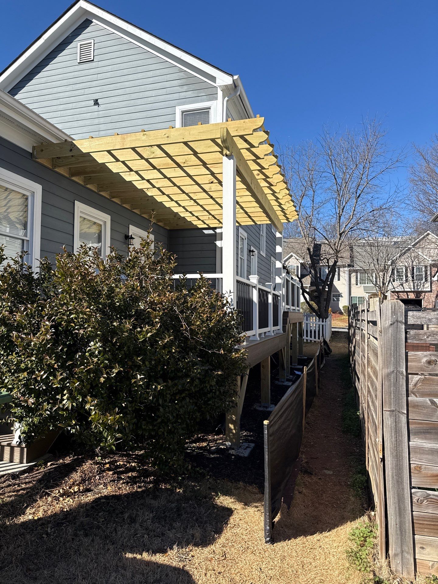Atlanta, GA Deck Rebuild and Pergola Build using Deckorators Venture Series Decking, Trex Composite Railing, and Pressure Treated Pine by Nelson Exteriors 