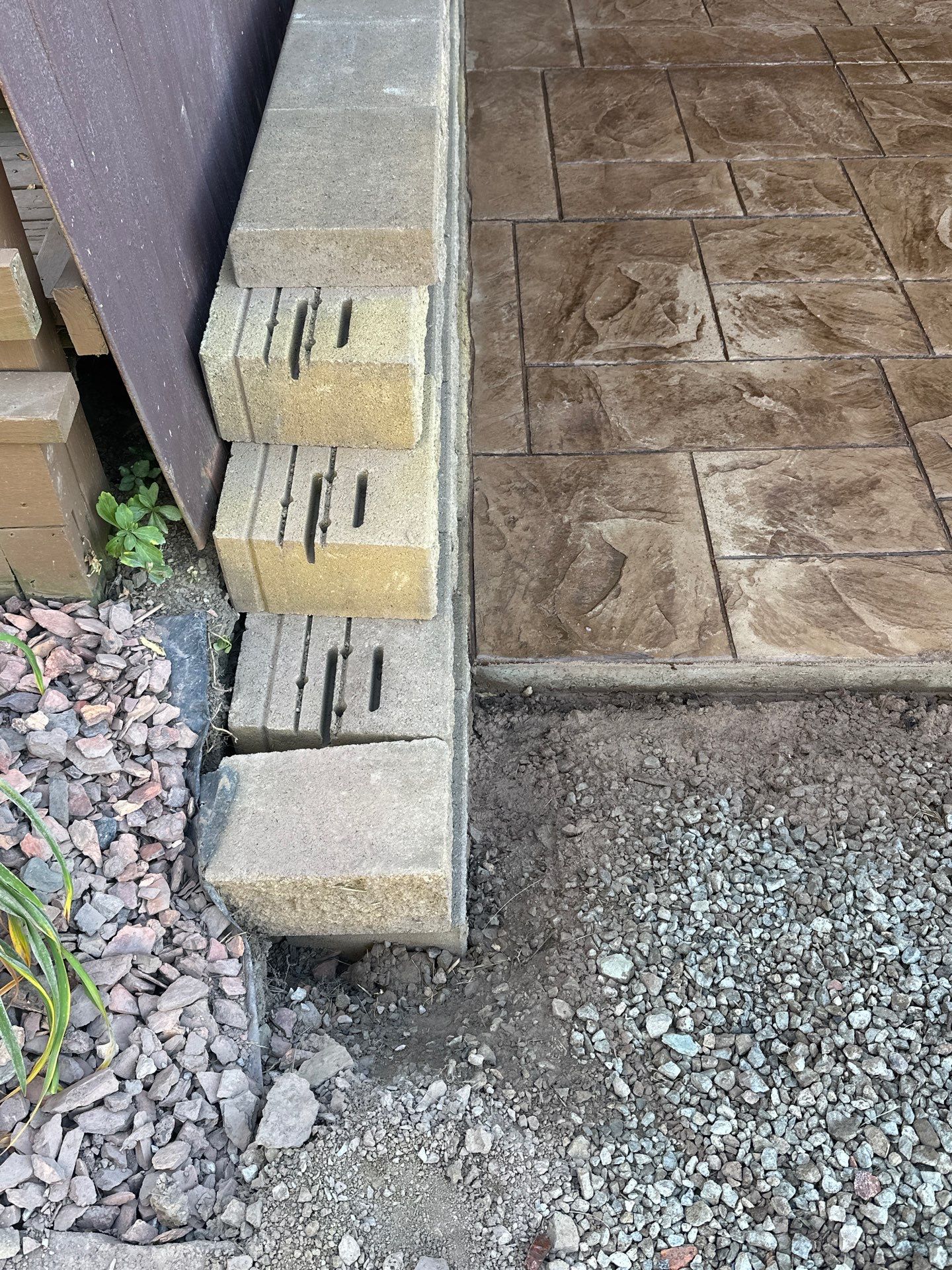 Stamped concrete and redeck  by Cousins Roofing Siding & Decks