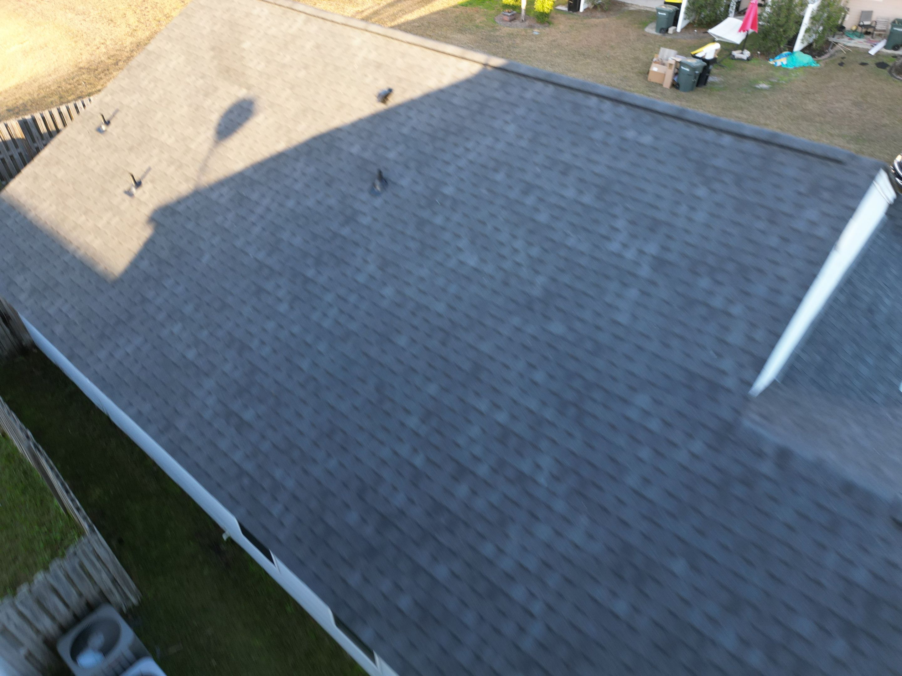 Residential Roofing Installation using Atlas Pinnacle Pristine Black Shadow. by Talya Roofing