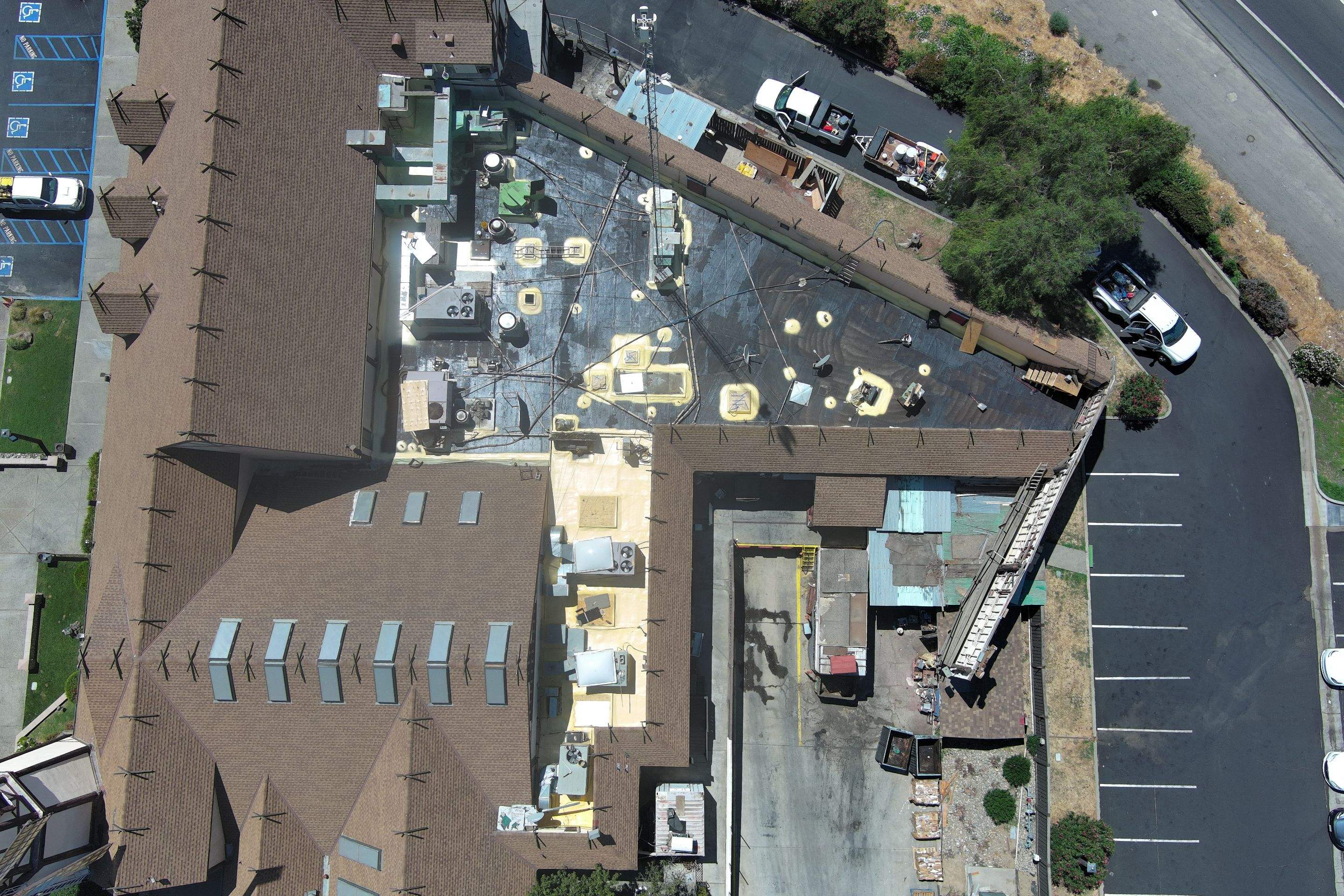 Spray foam and coatings using General Coatings acrylic coatings and spray foam by Straight Edge Roofing Inc