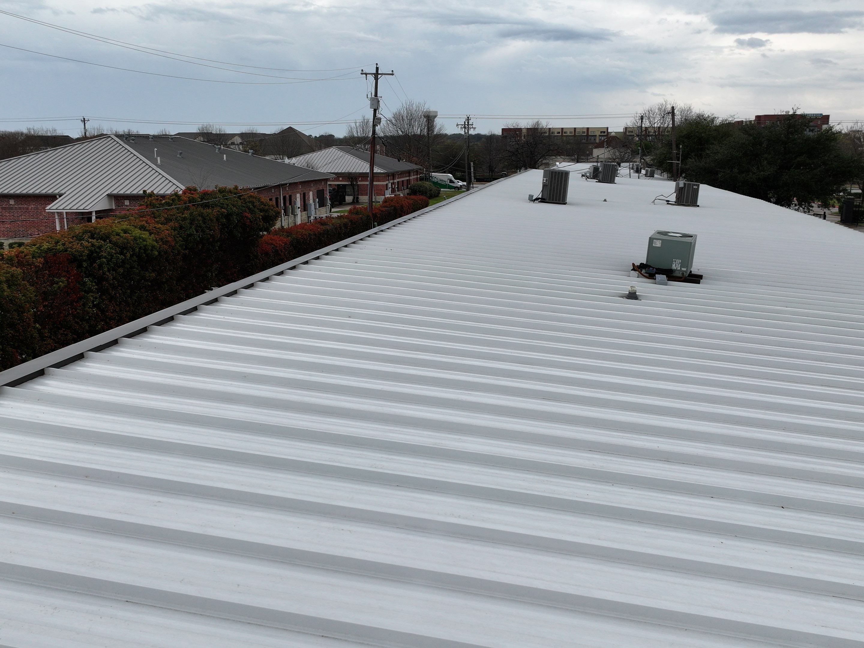Commercial Roofing Installation using Double lock Mechanical Standing Seam Metal by Becker Roofing and Exteriors