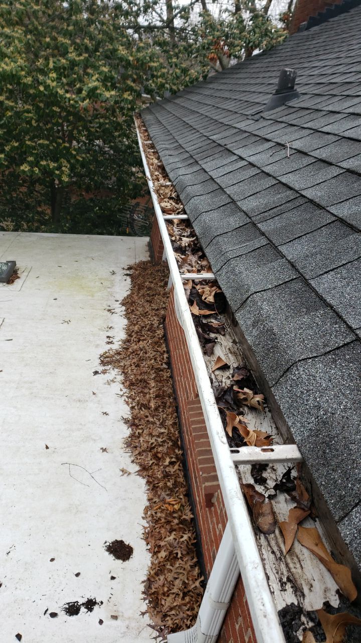 Gutter Cleaning using cleaner by Power Wash Masters LLC