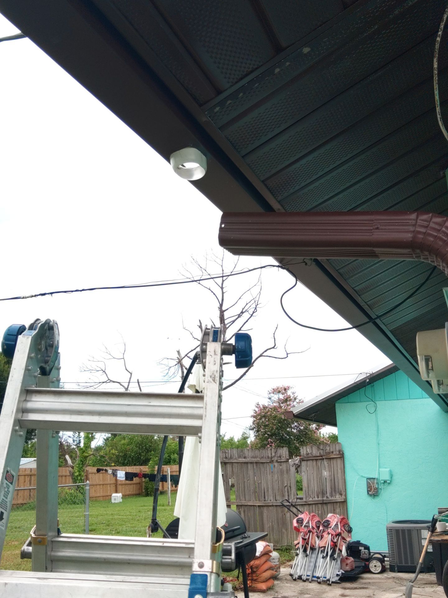 Aluminum Downspouts and Elbows in Englewood FL by Gutter Professors