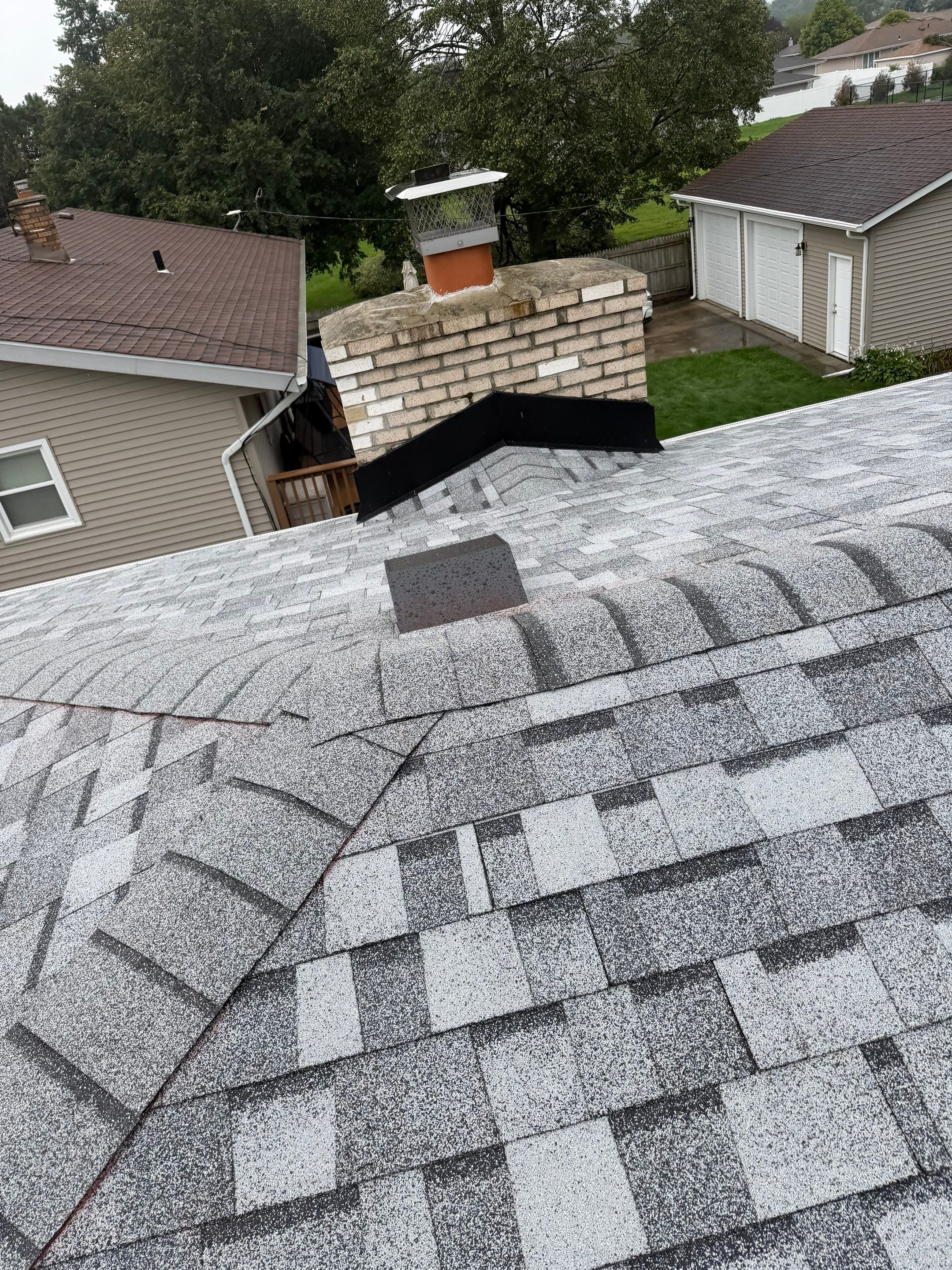 Roofing & gutters by Optimal Home Improvement 