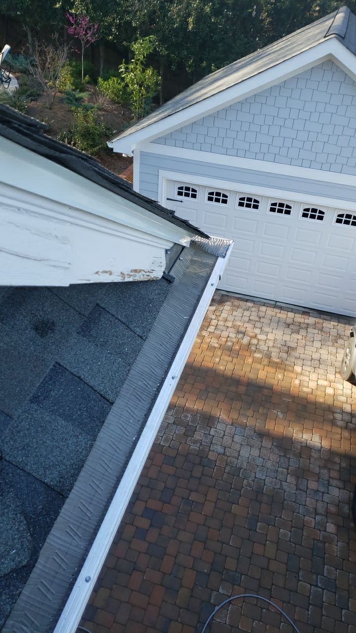 Gutter Cleaning using water by Power Wash Masters LLC