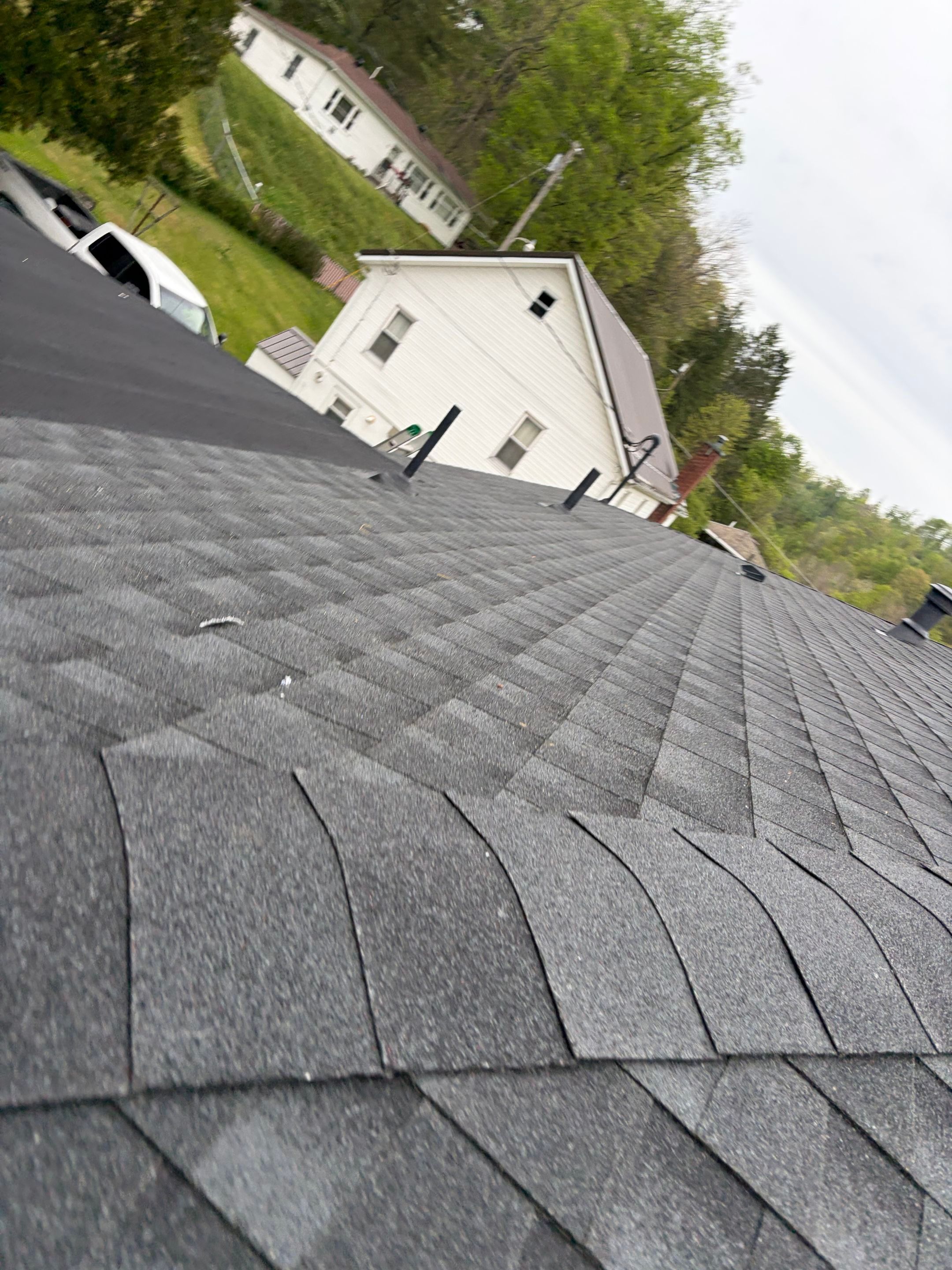 Residential Roofing Installation using GAF Timberline HDZ Charcoal by Rainstoppers Roofing