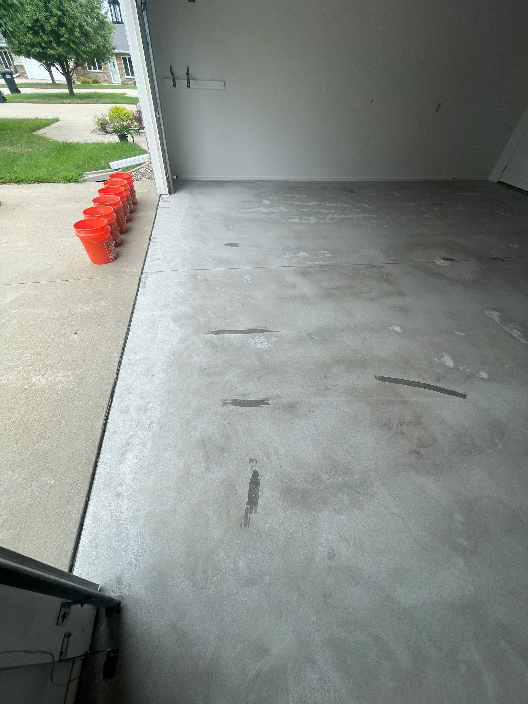 Coyote Flake Garage Floor Coating in Worthington, Minnesota by Select Painting, Coatings & Garage Cabinets