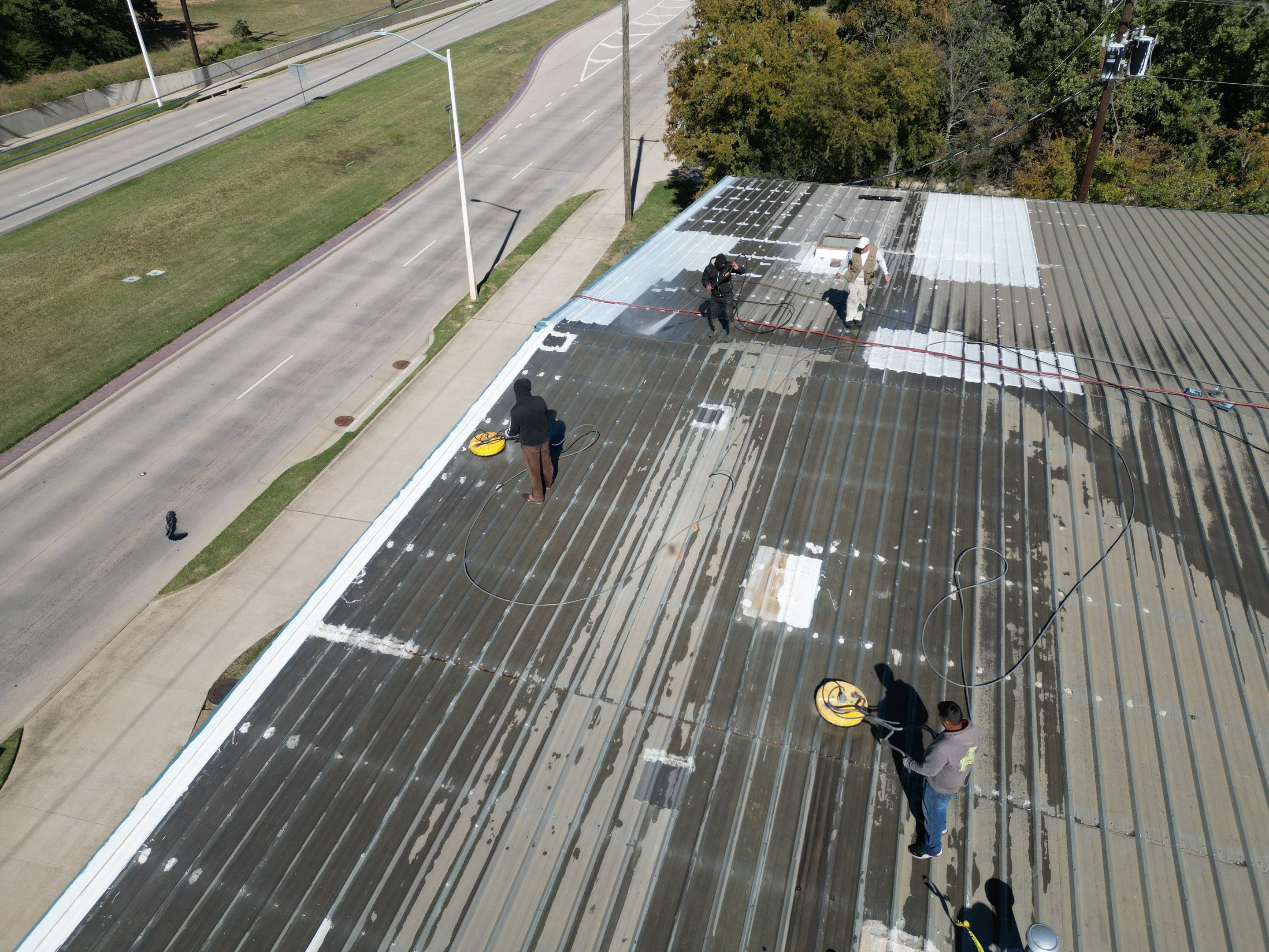 Silicone Coating Metal Rehab by First Out Roofing 