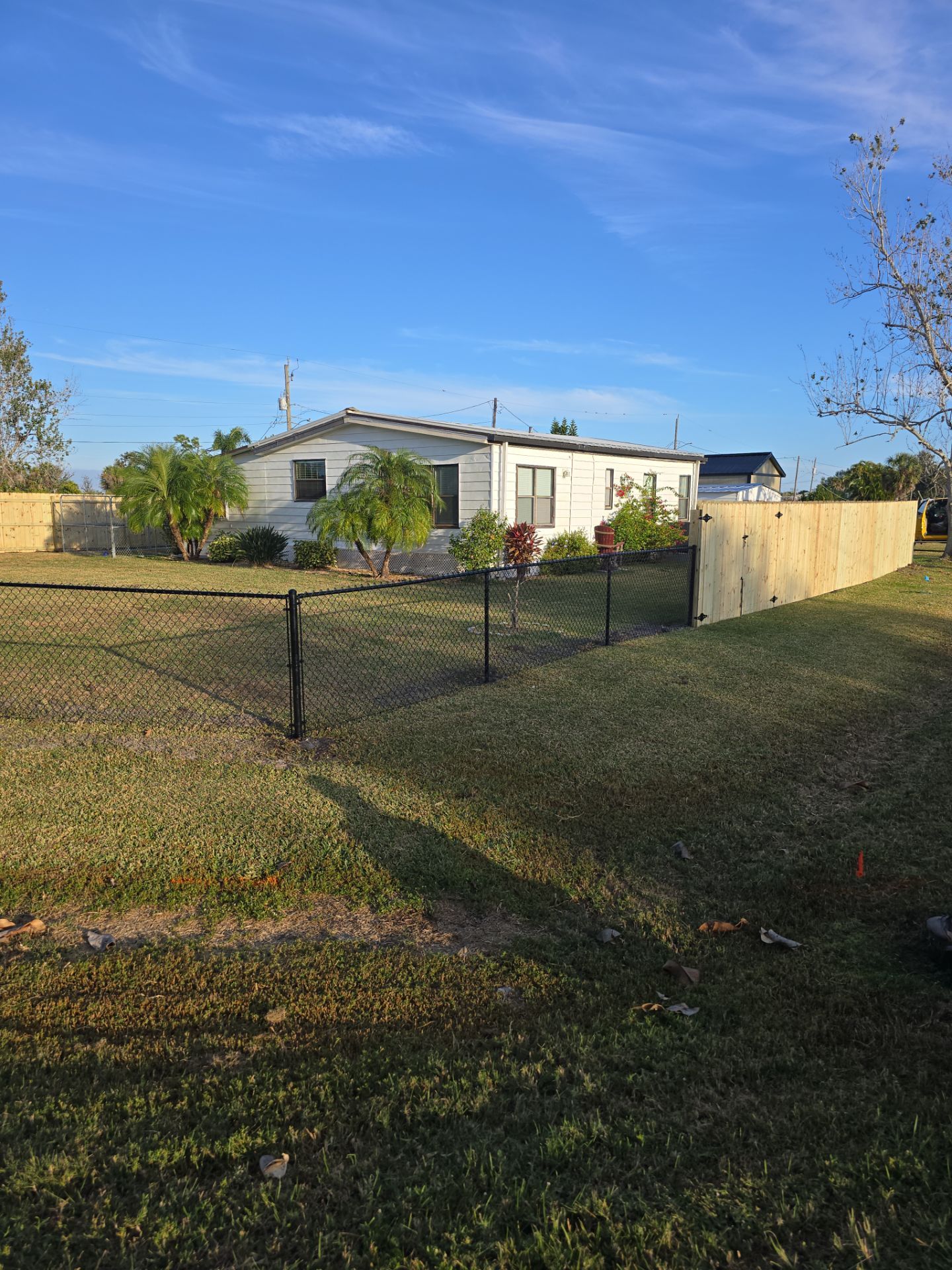 Wood and Chain Link Fence in Port Charlotte by True Fence LLC
