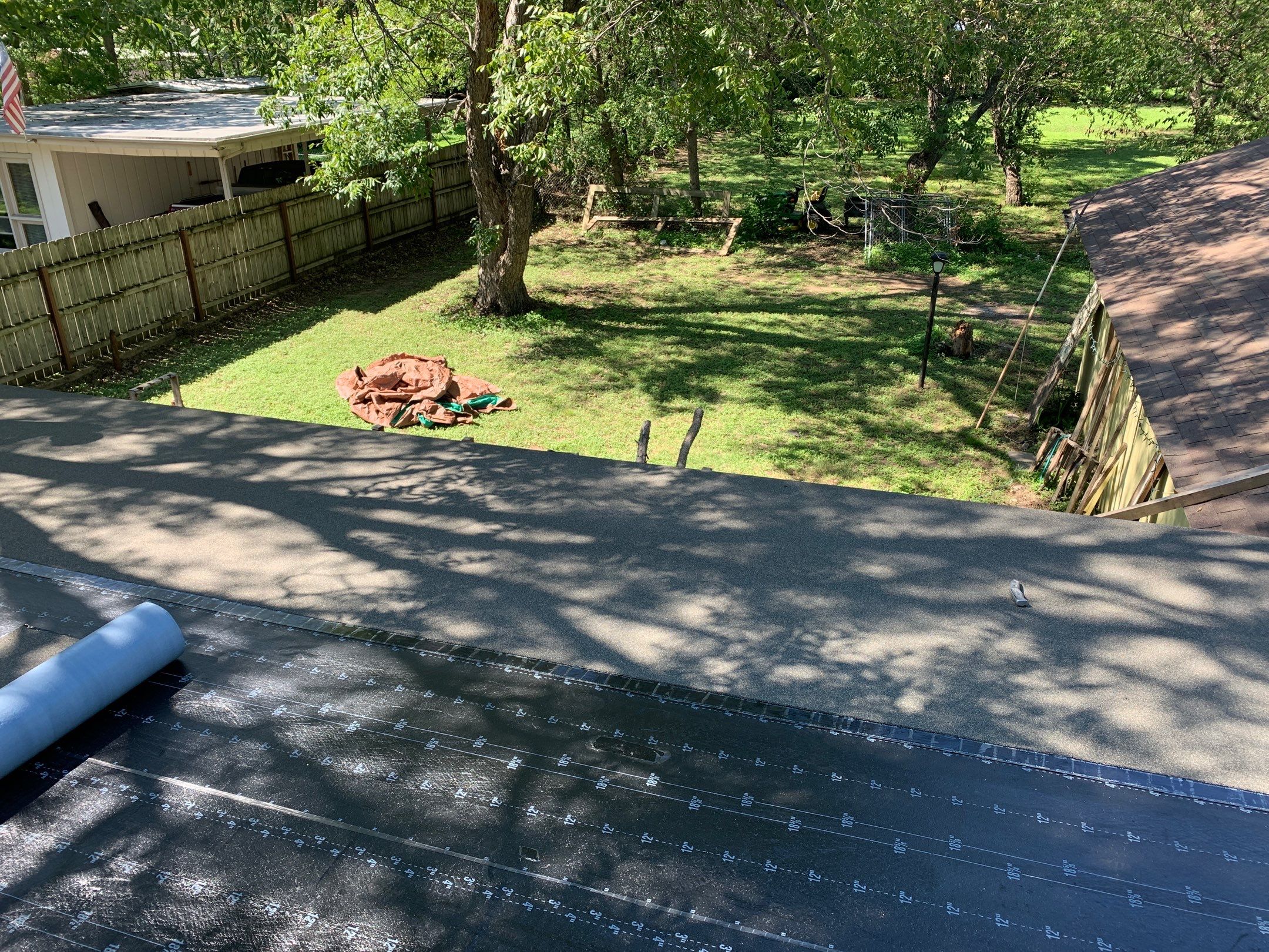 Residential Roofing Installation using Modified Bitumen Roll Roofing by Harvey Roofing & Construction