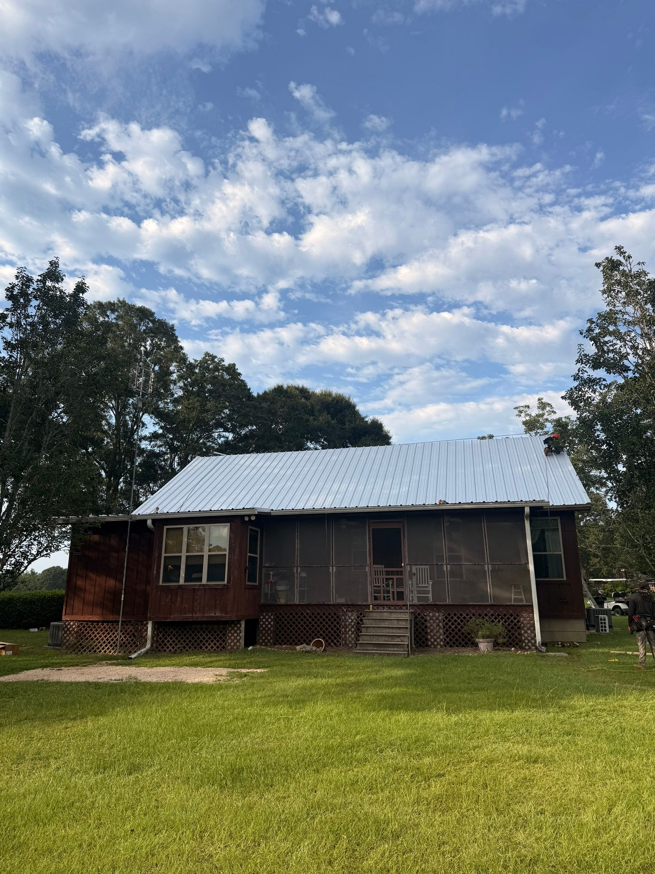 Residential Metal Roof Replacement With Corrugated Panels in Poplarville by Frontline Roofing