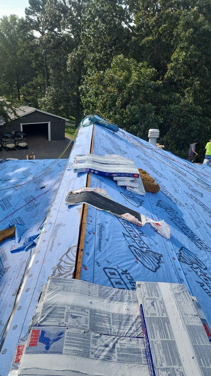 Country Club Roofing Installation by Reset Roofing