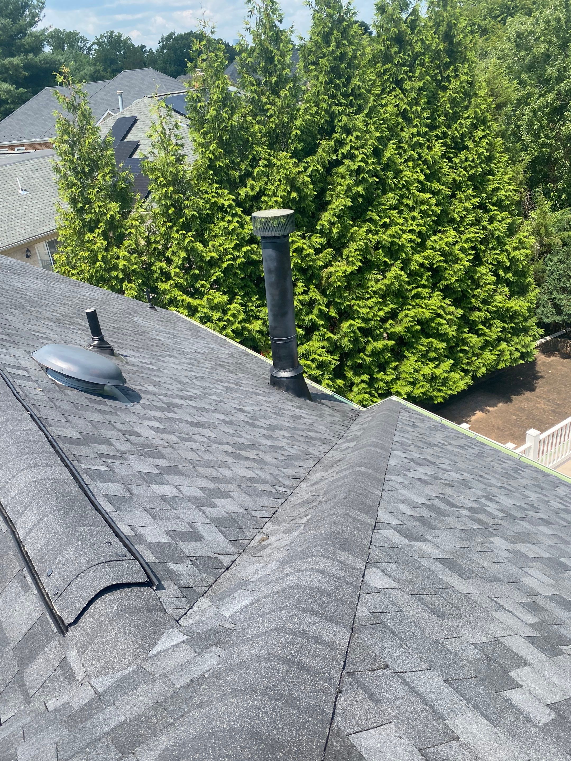 McLean: Residential Roof Installation with Landmark Pro Designer Shingles in Max Def Moire Black by RM Banning, Inc.