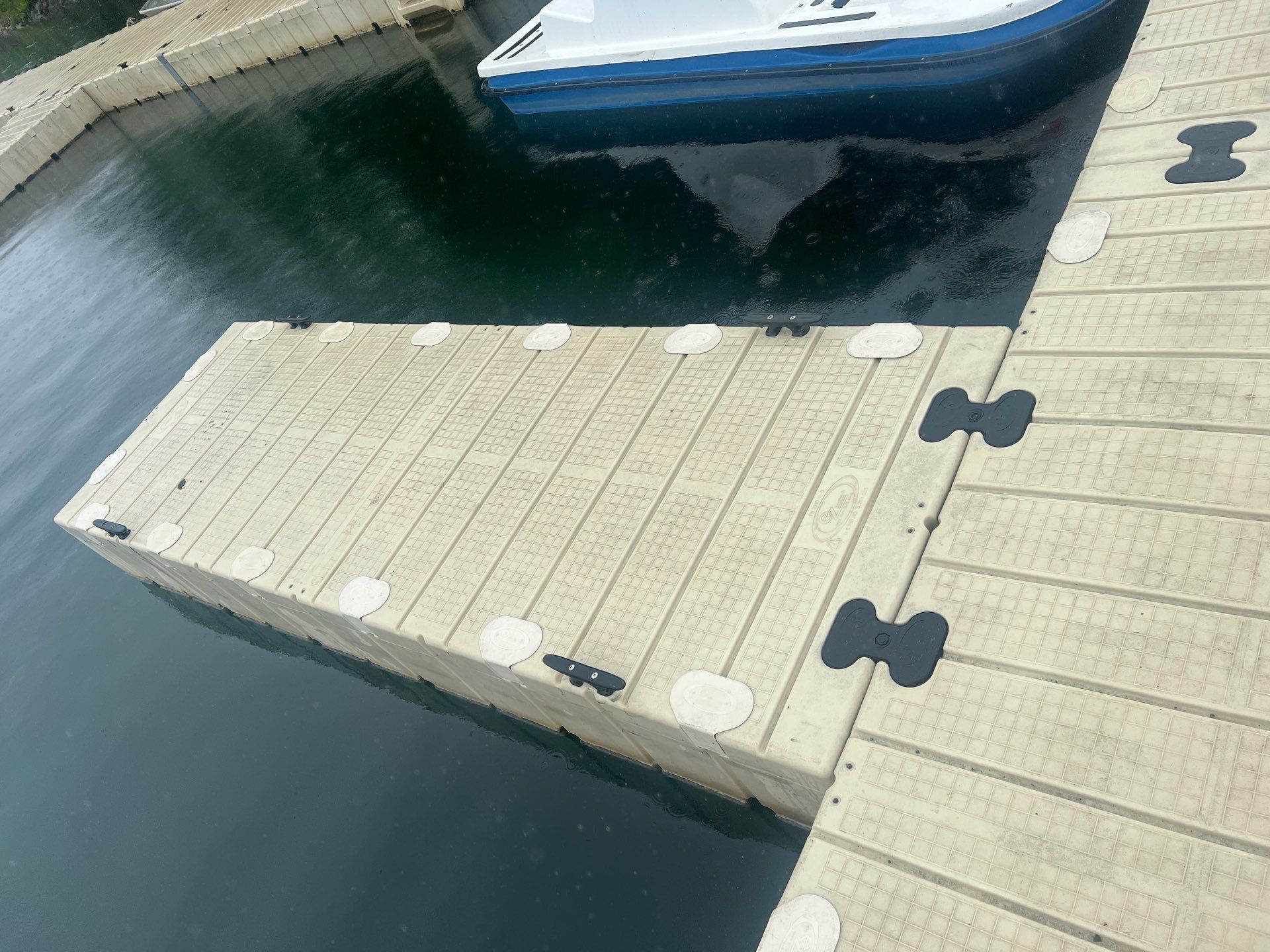 Power washing of floating dock by Northern Power Washing LLC.