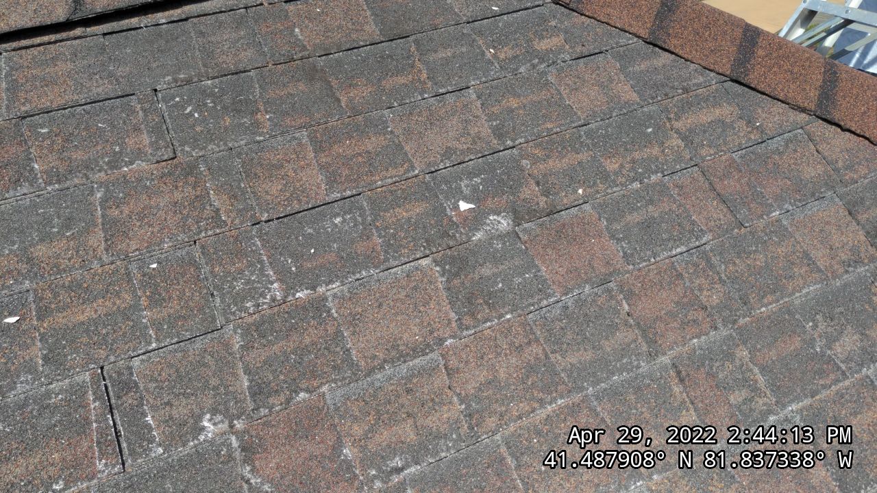 Residential Roofing Installation, Dec-tek walk-out porch roof, siding on garage by Absolute Roofing and Construction