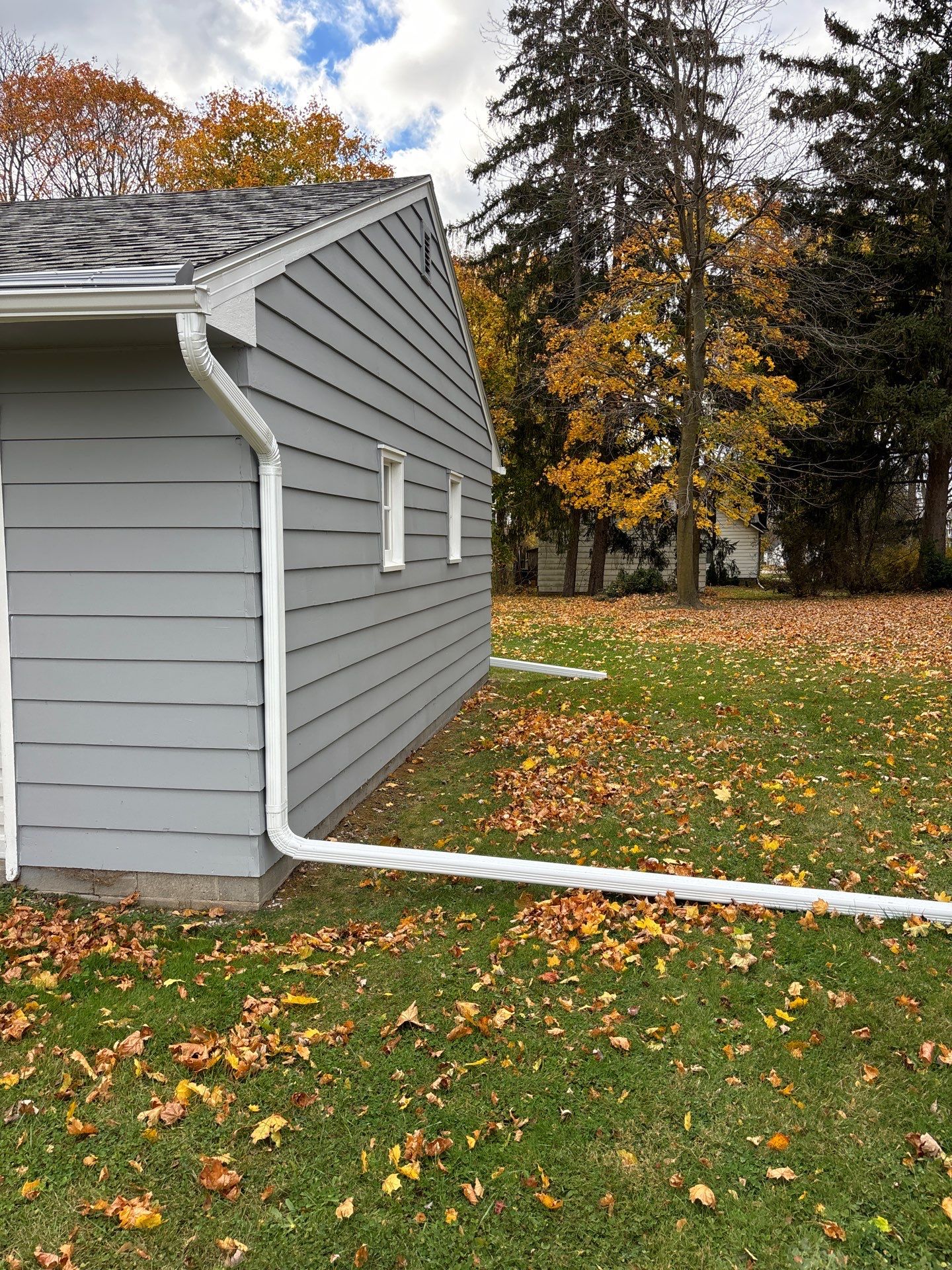 Gutter Installation using Seamless Gutters- Aluminum with Gutter Protection by Acme Exteriors