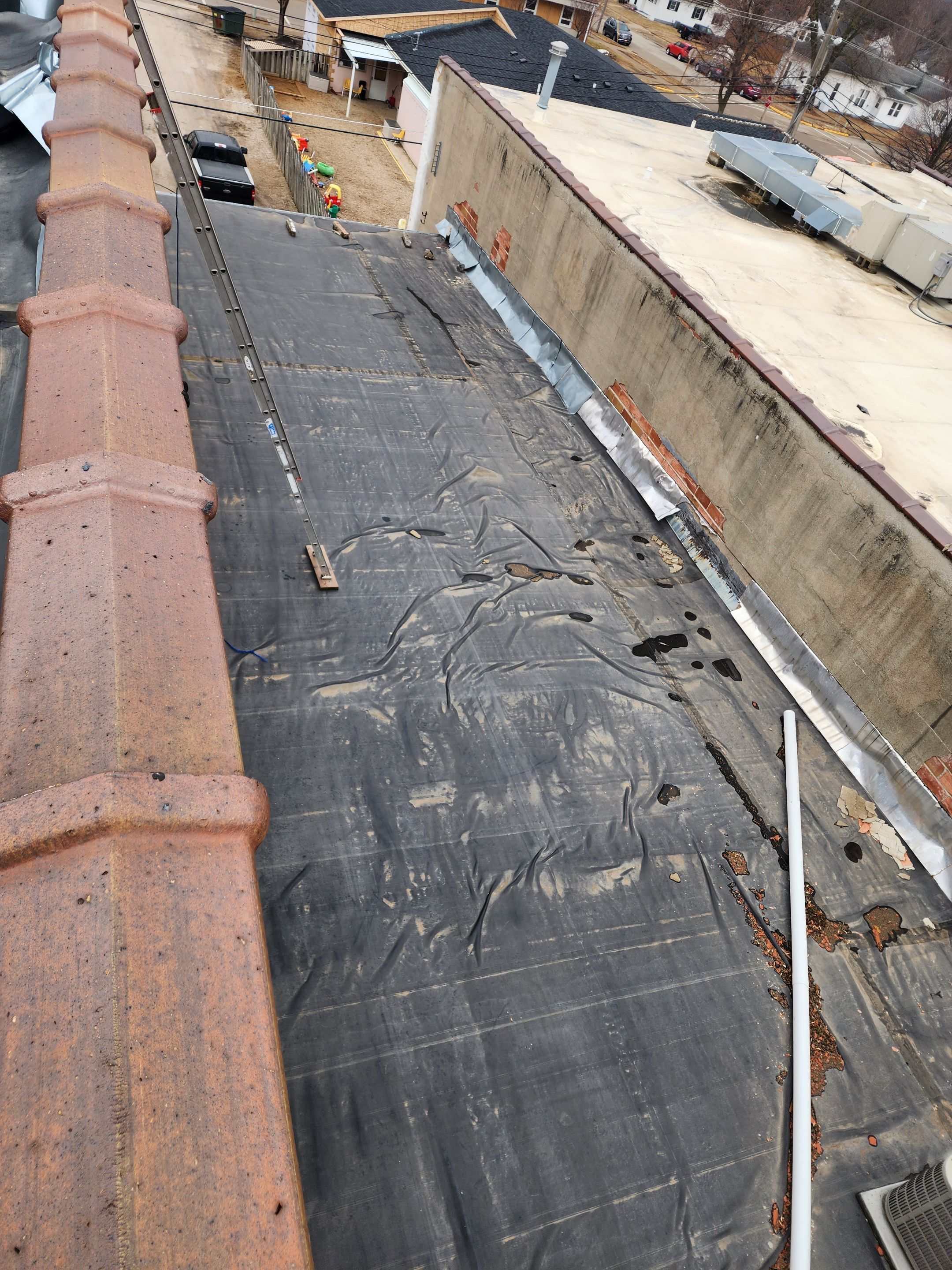 Roof Recover on a downtown building in Lake City  by Grell Roofing, LLC