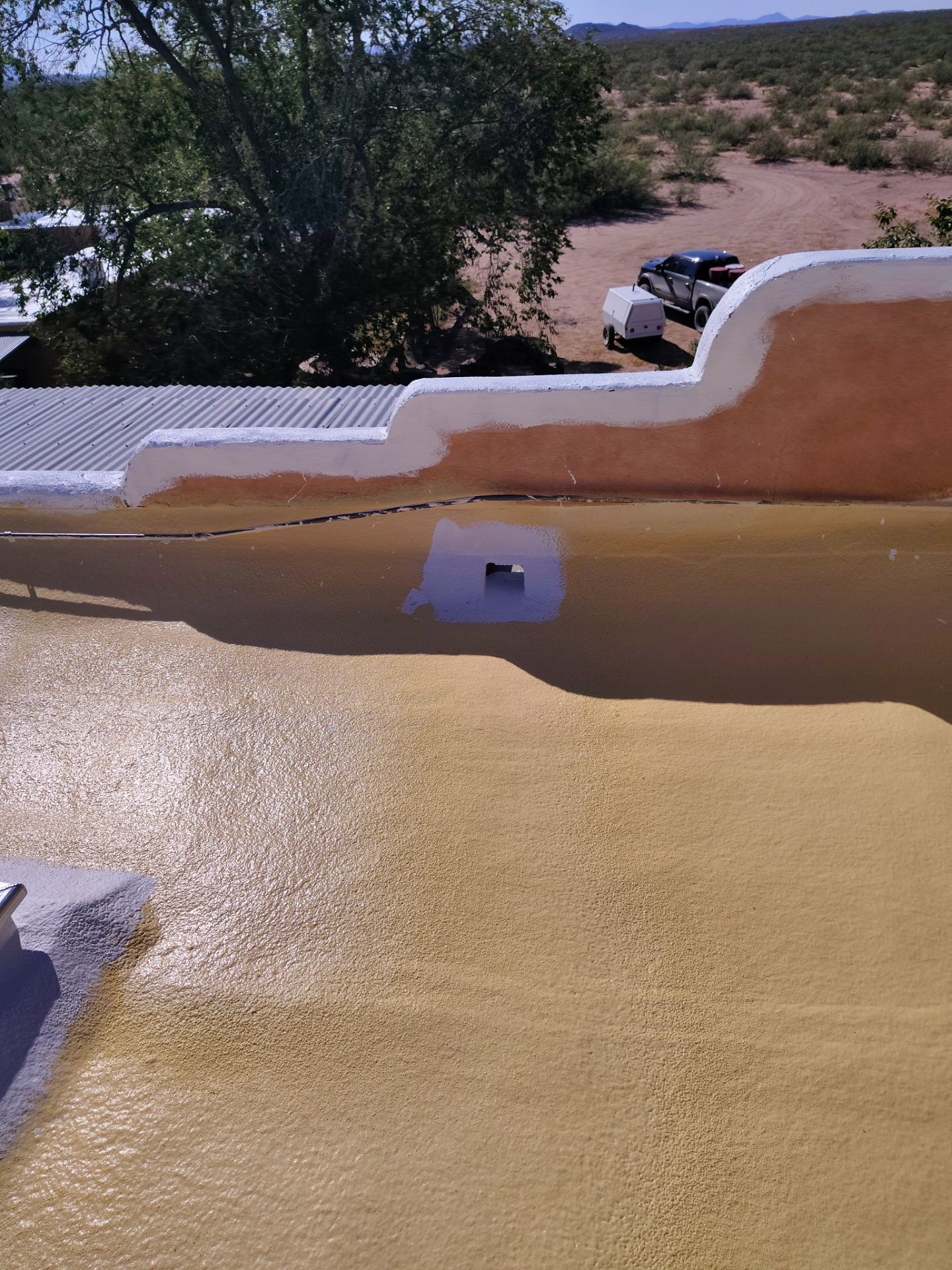 Residential roof application by SPF Services 