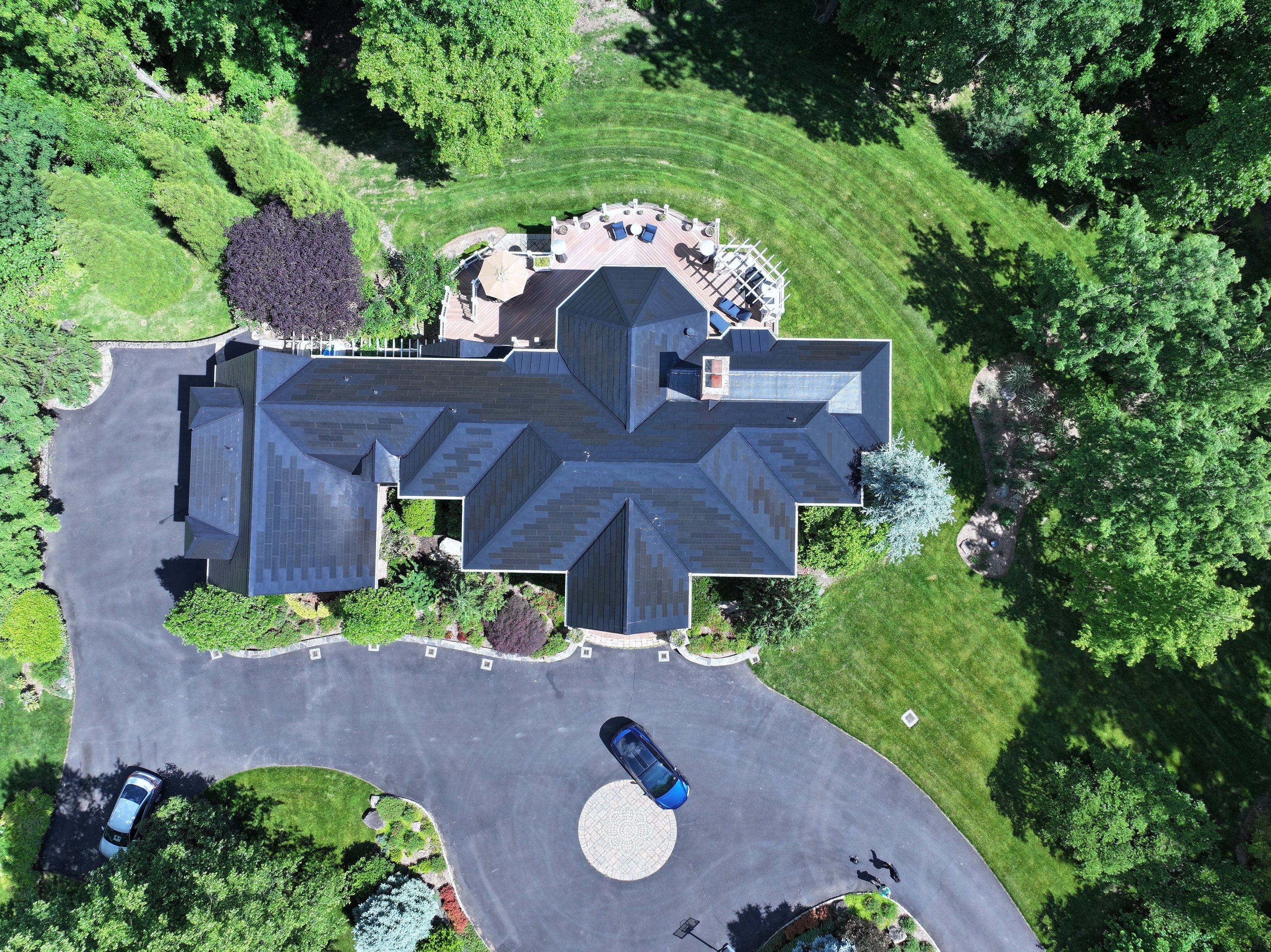 Tesla Solar Roof Replacement by American Home Contractors