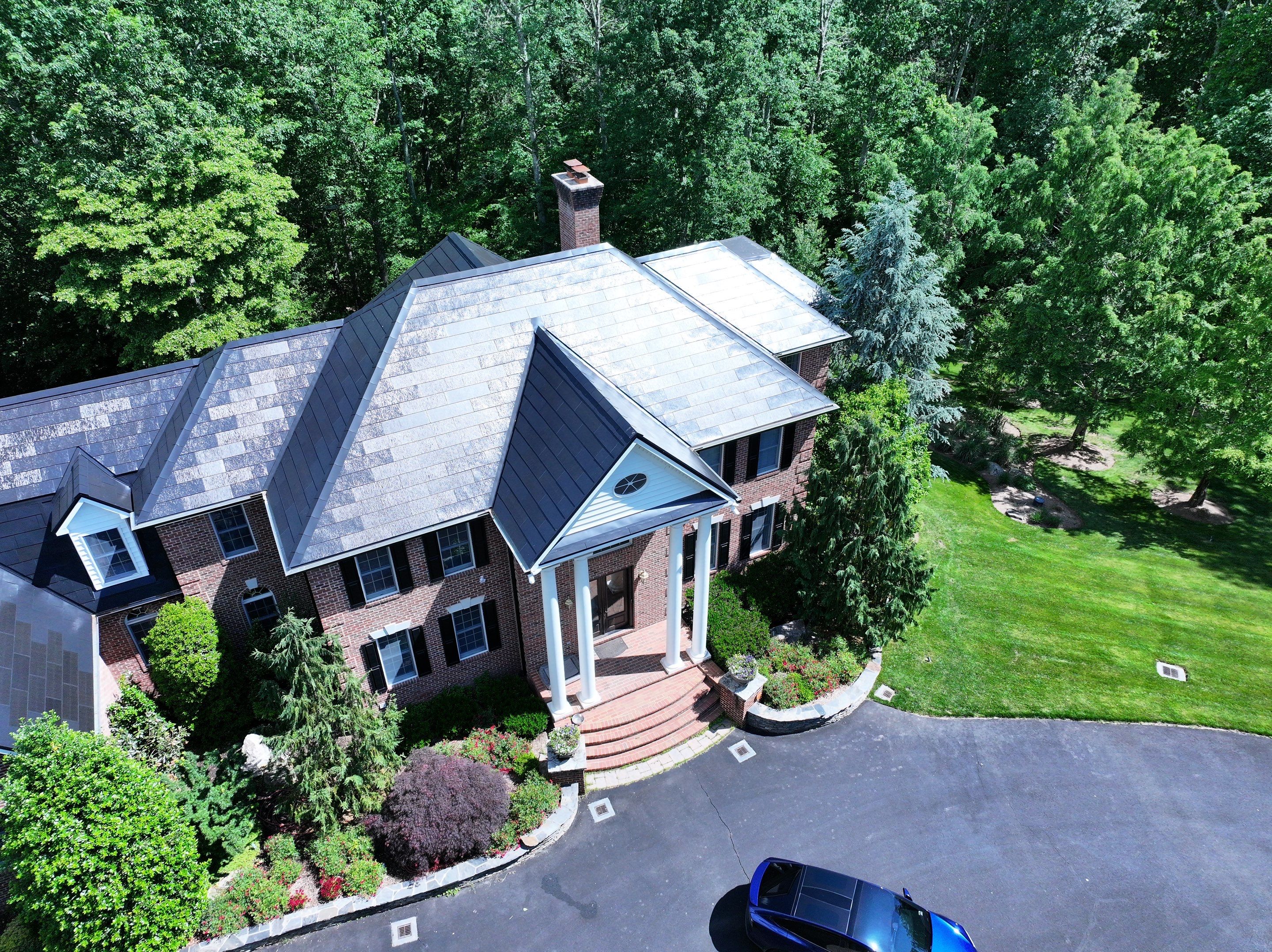 Tesla Solar Roof Replacement by American Home Contractors