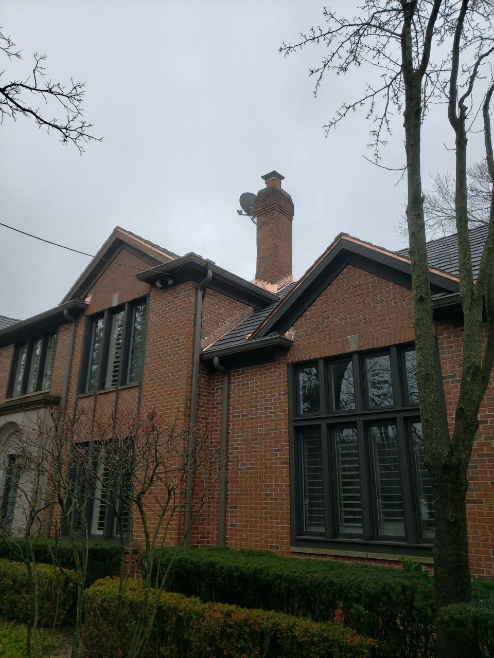 DaVinci Slate Installation with Copper Valleys by Custom Installations