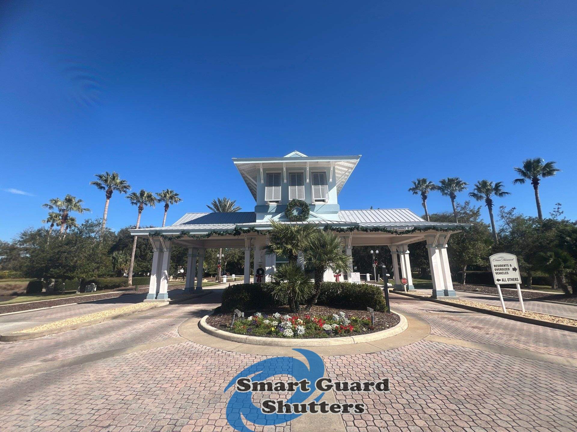 Decorative Bahama Shutters in Window Grey by Smart Guard Shutters