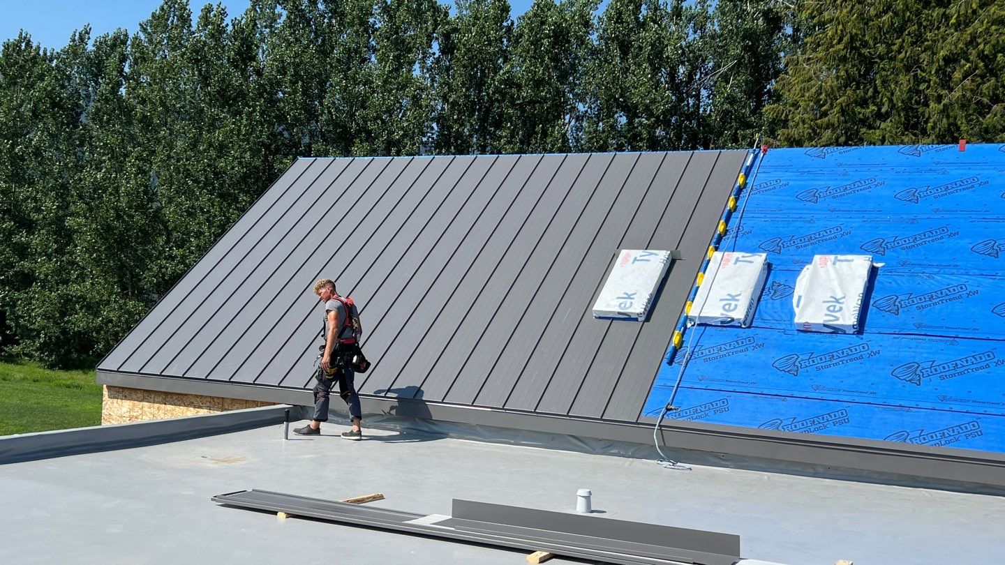 Residential Roofing Installation using multiple products by Top Notch Roofing Inc