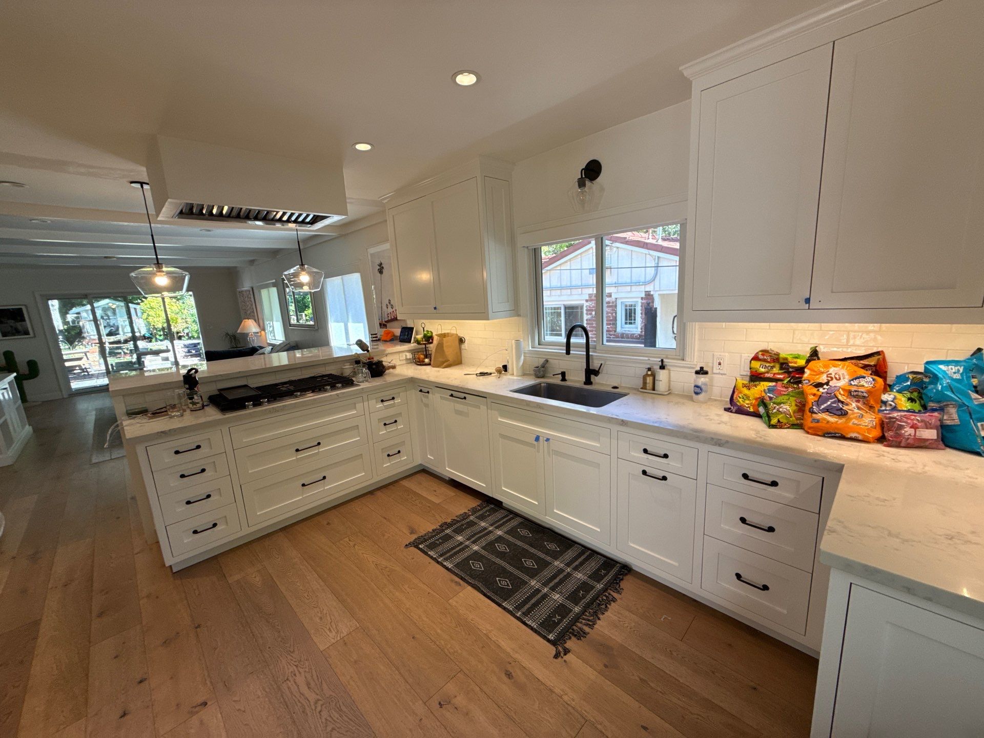 Modern Kitchen and Bathroom Transformation With Herringbone Tile in Lafayette by Hexagon Construction