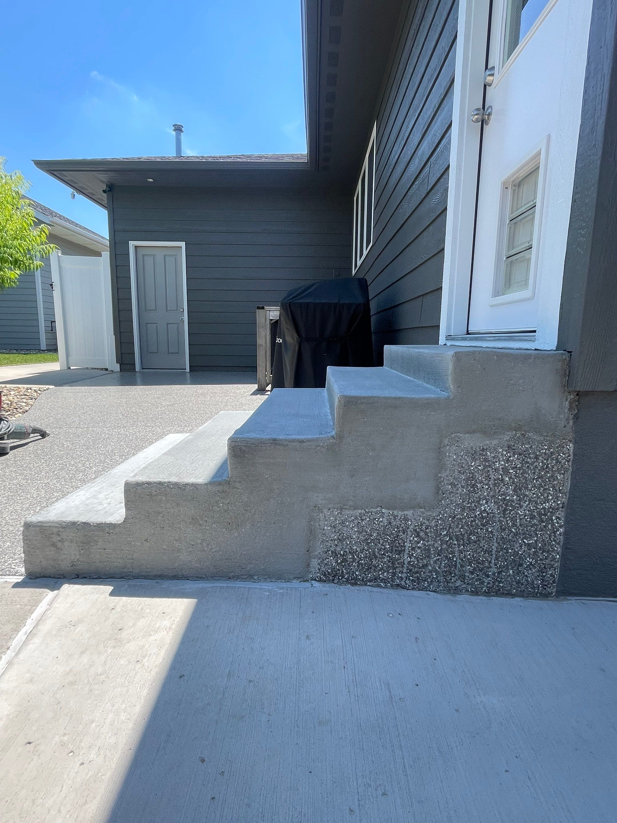 Silver Creek Flak Coating for Patio and Entry Steps in Sioux Falls by Select Painting, Coatings & Garage Cabinets