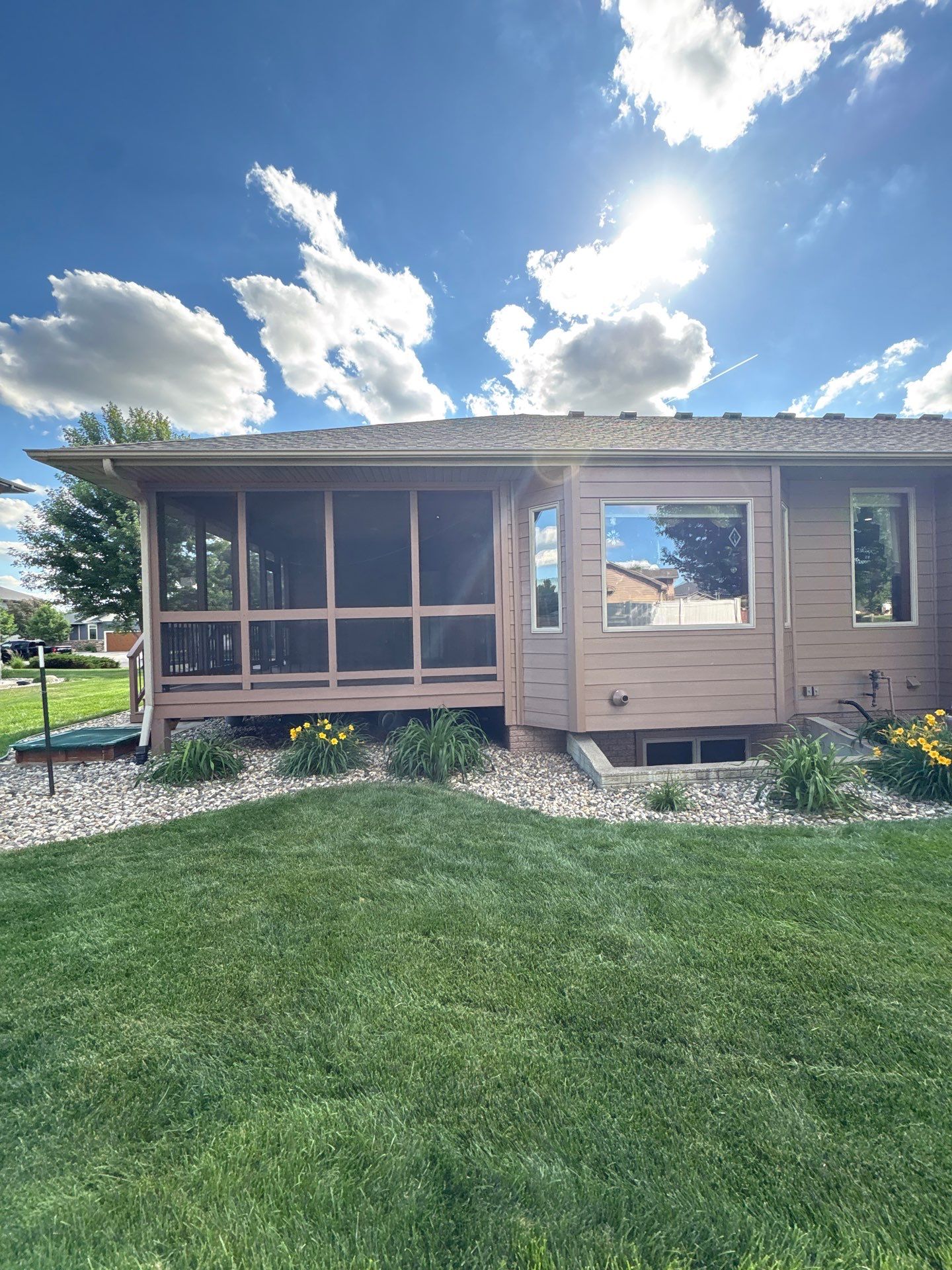 Exterior Painting and Wooden Deck Staining in Sioux Falls by Select Painting, Coatings & Garage Cabinets