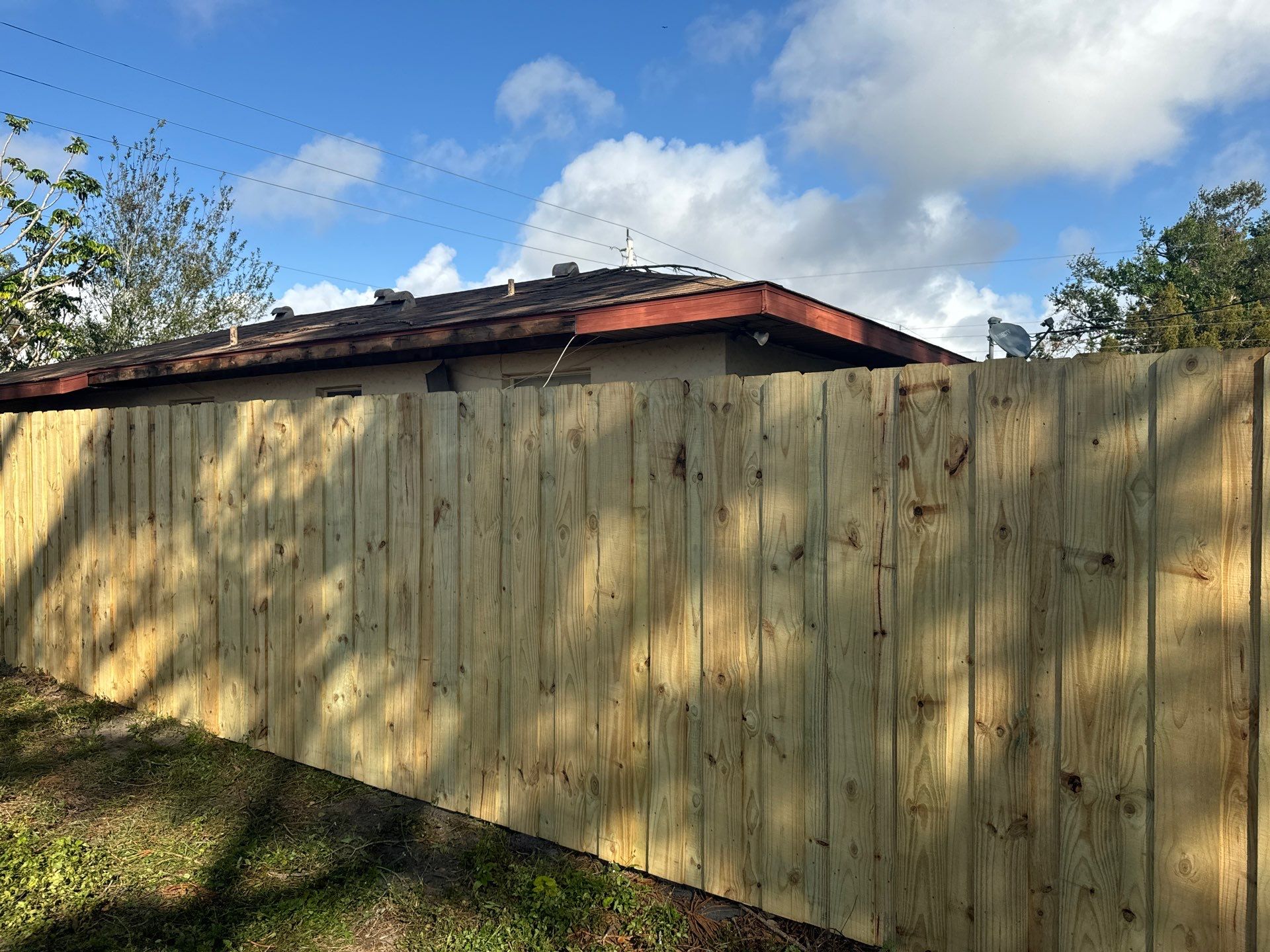 Wood Fence Installation using 6Ft Pressure Treated Wood Board On Board Privacy Fence by Asap fence and gates, LLC
