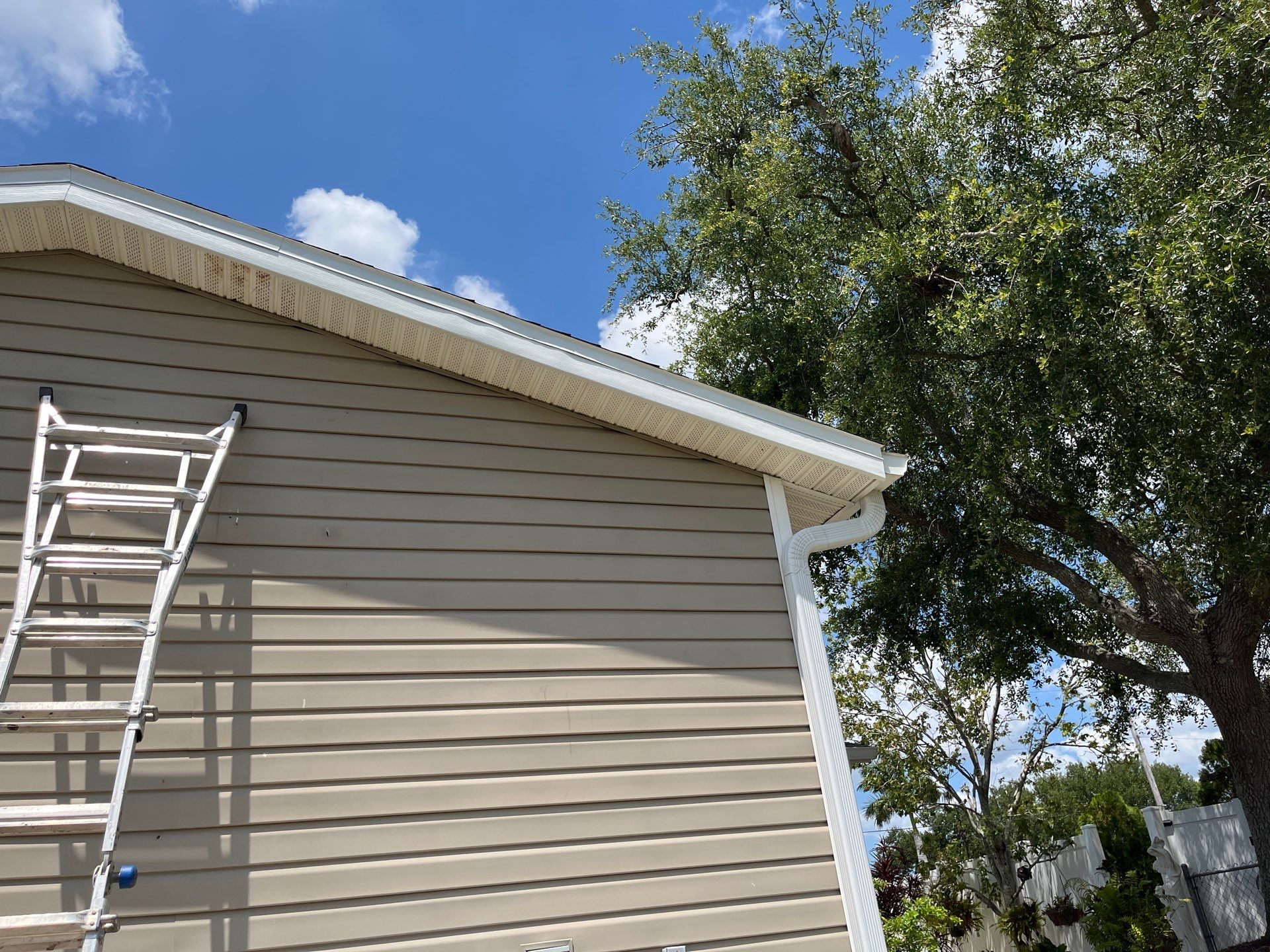 Replace gutter using Leaf Guard in Cape Coral FL by Gutter Professors