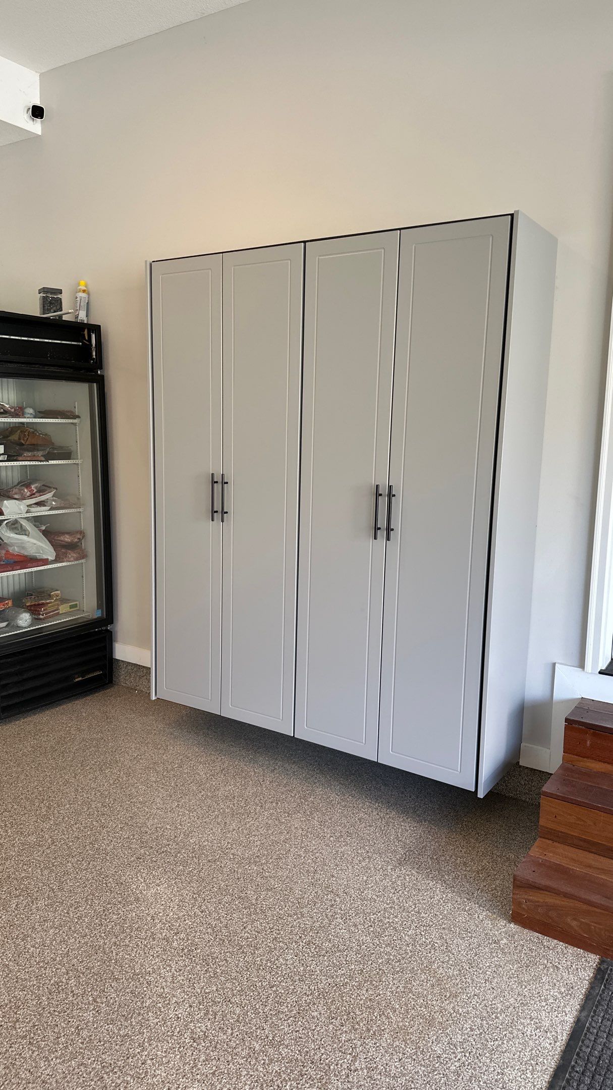 Robert B. upgraded his garage with cabinets and slotwall by Banner Garage