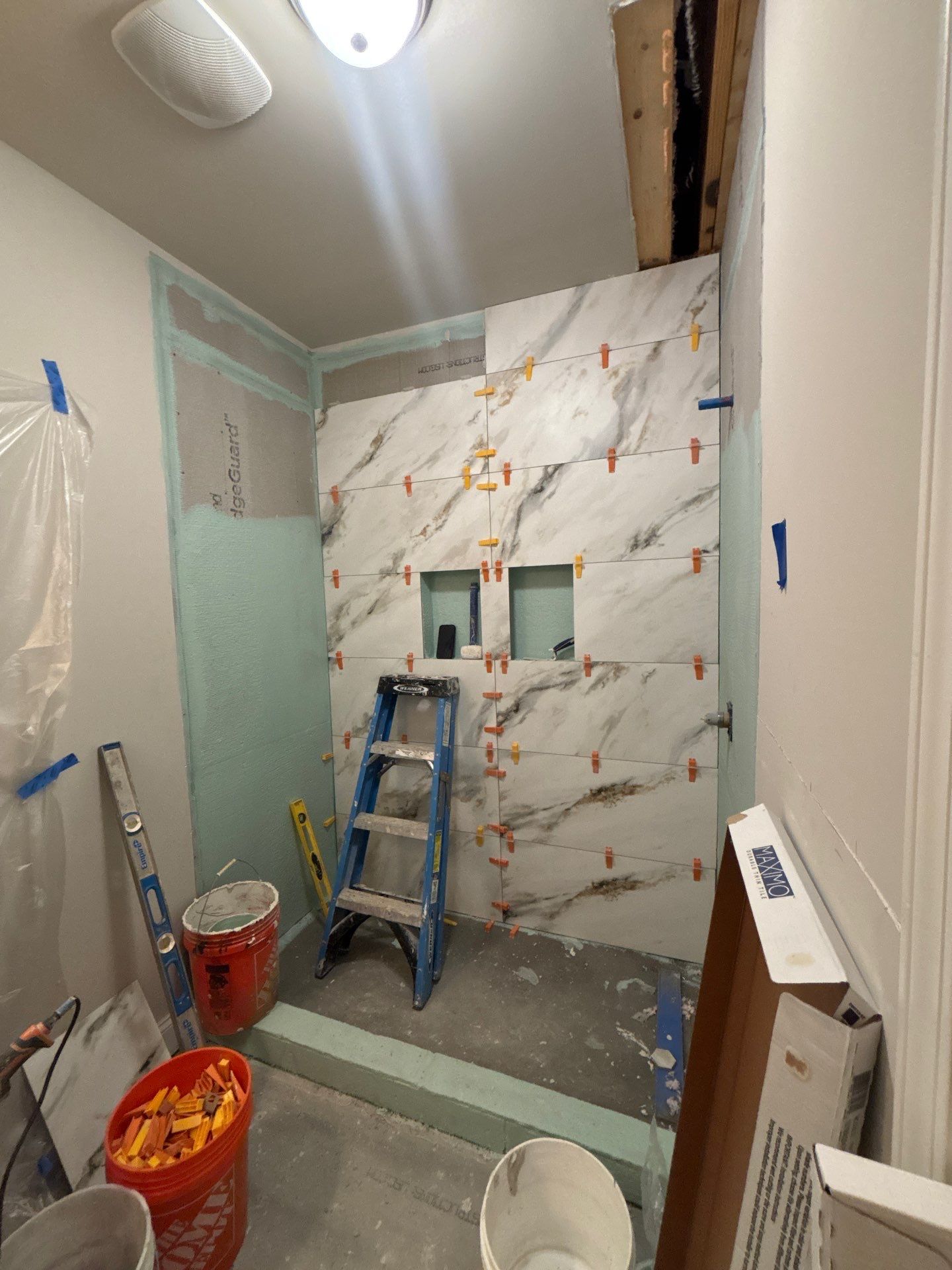 Three showers renovation by Prudencio
