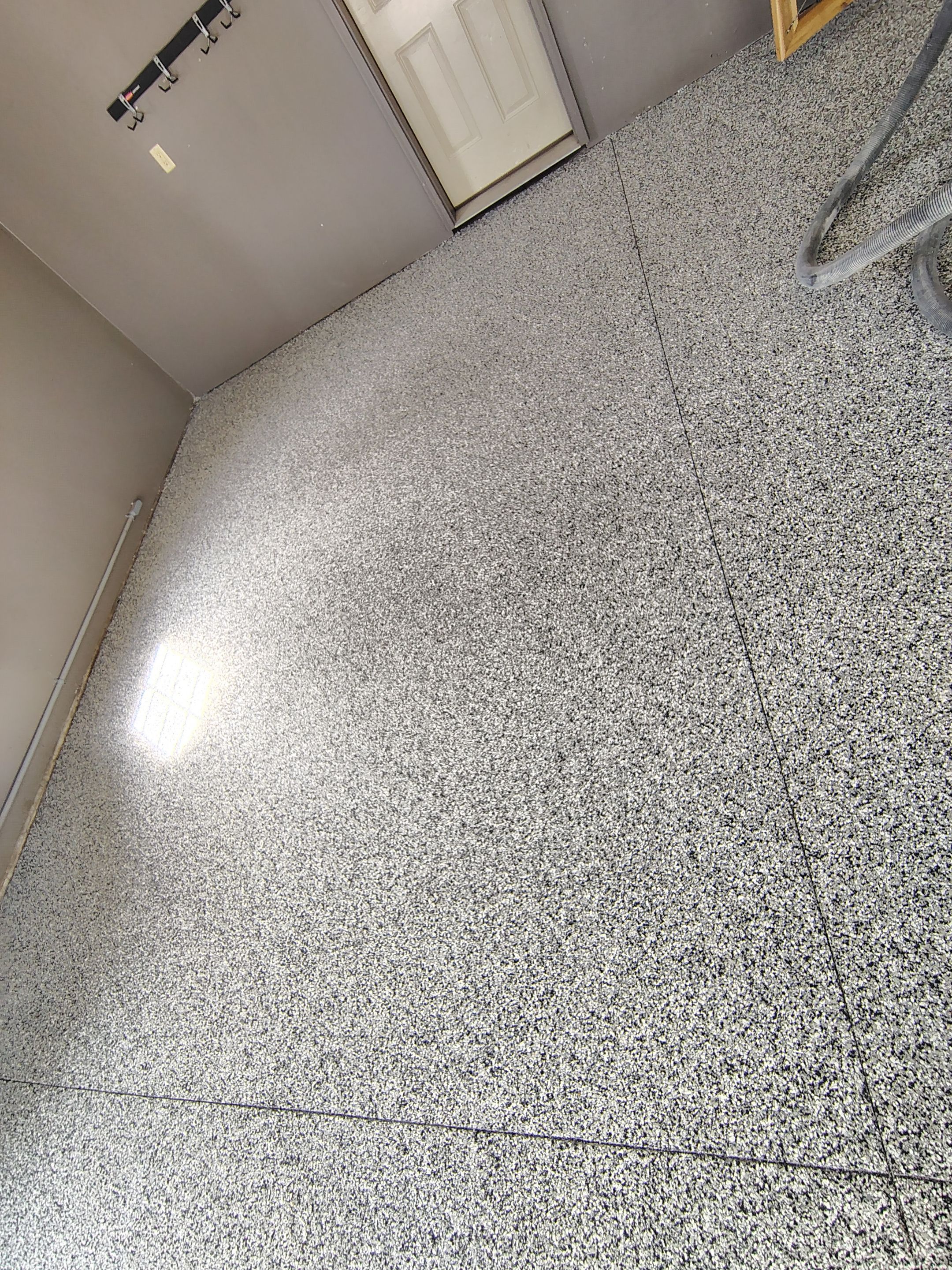 Garage Floor Concrete Coating and Crack Repair in Sioux Falls by Select Painting, Coatings & Garage Cabinets