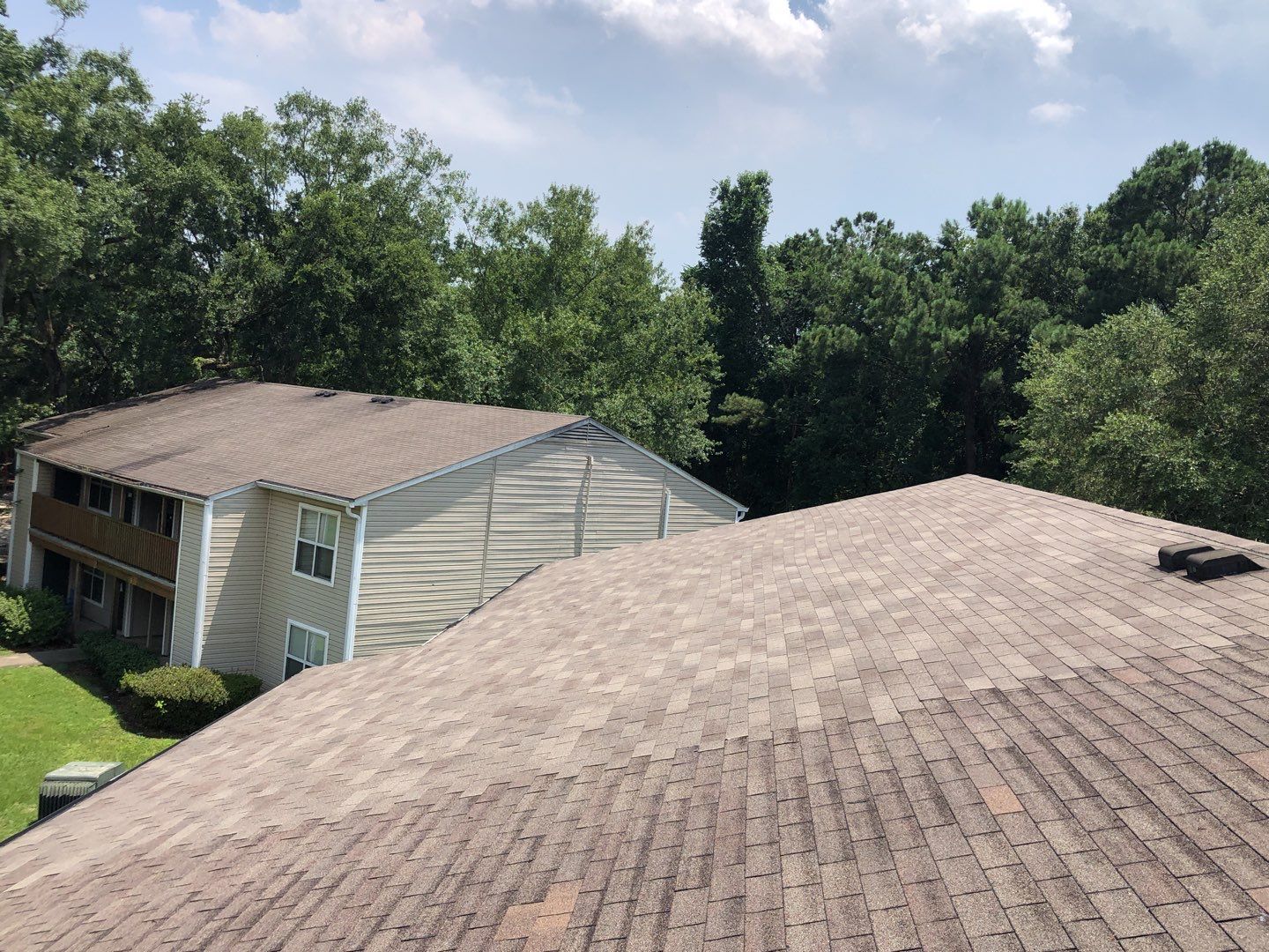 Residential Roofing Installation using Roof Replacement by American Roofing & Construction LLC